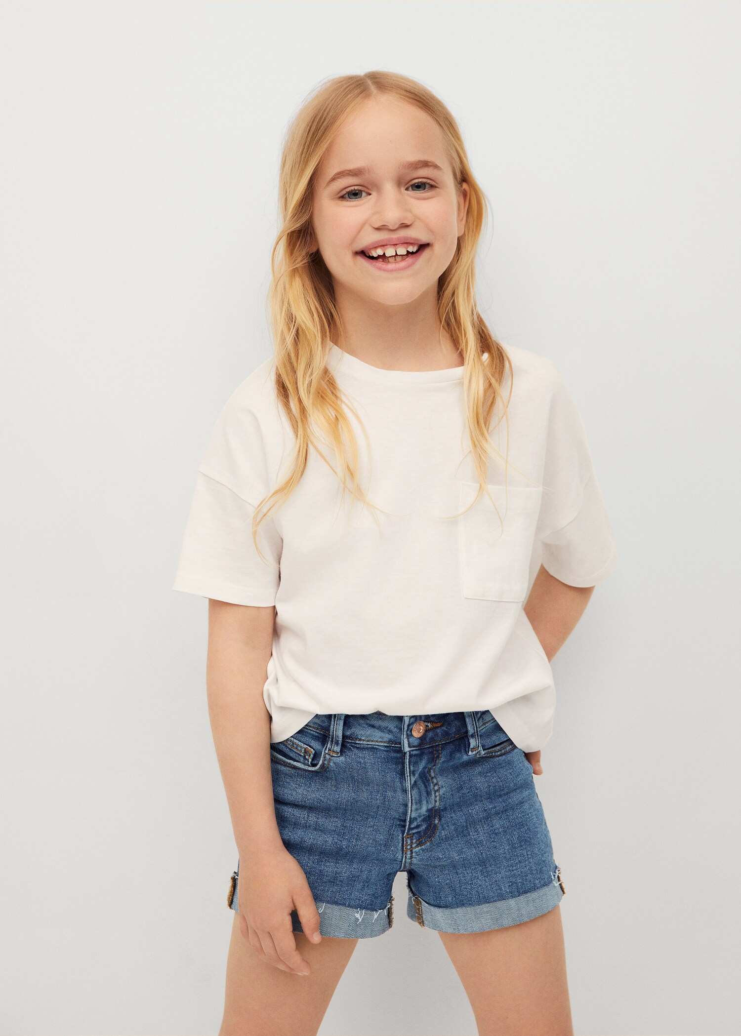 Short denim bajo vuelto - Plano medio