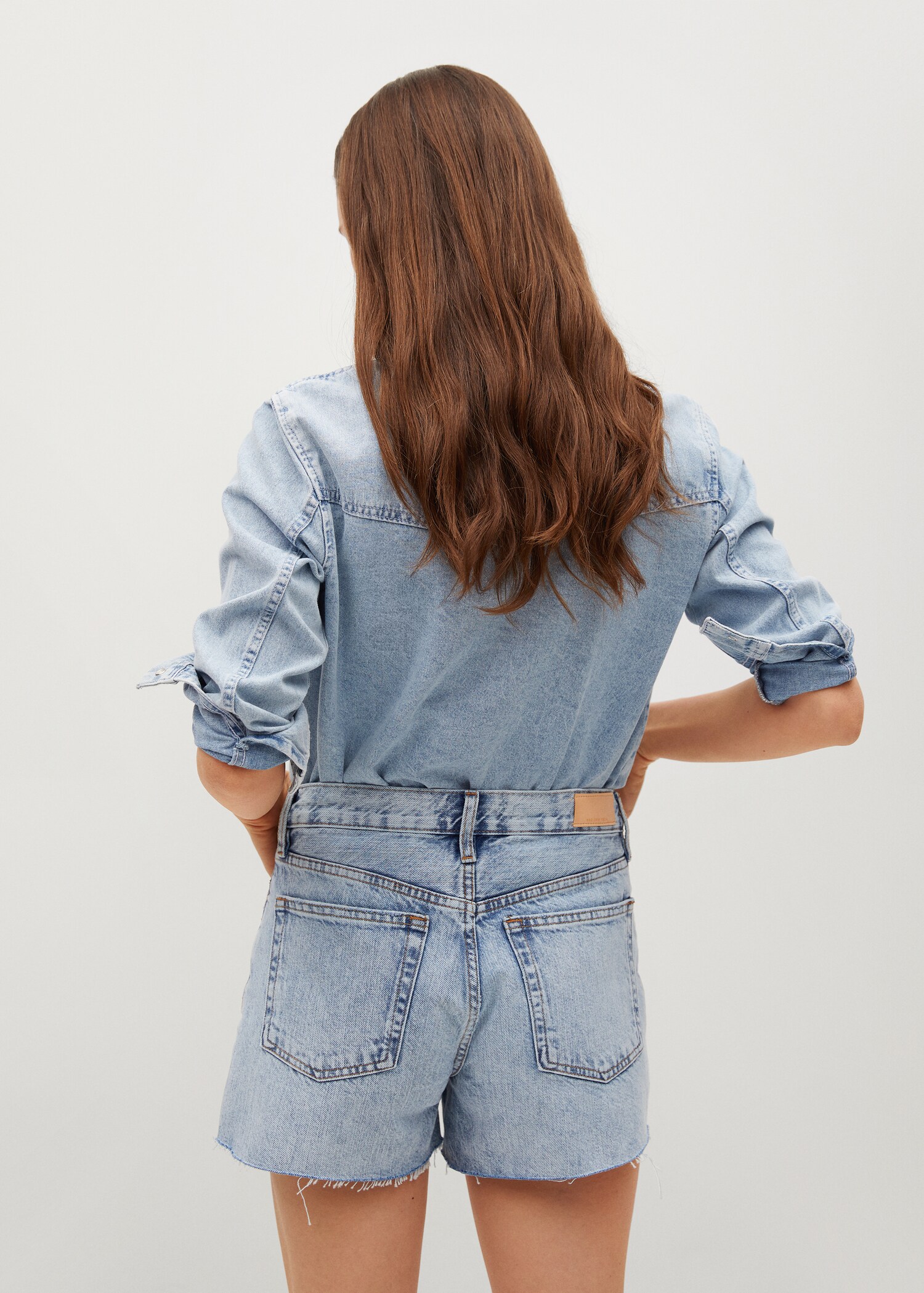 Mini shorts with frayed hem - Reverse of the article