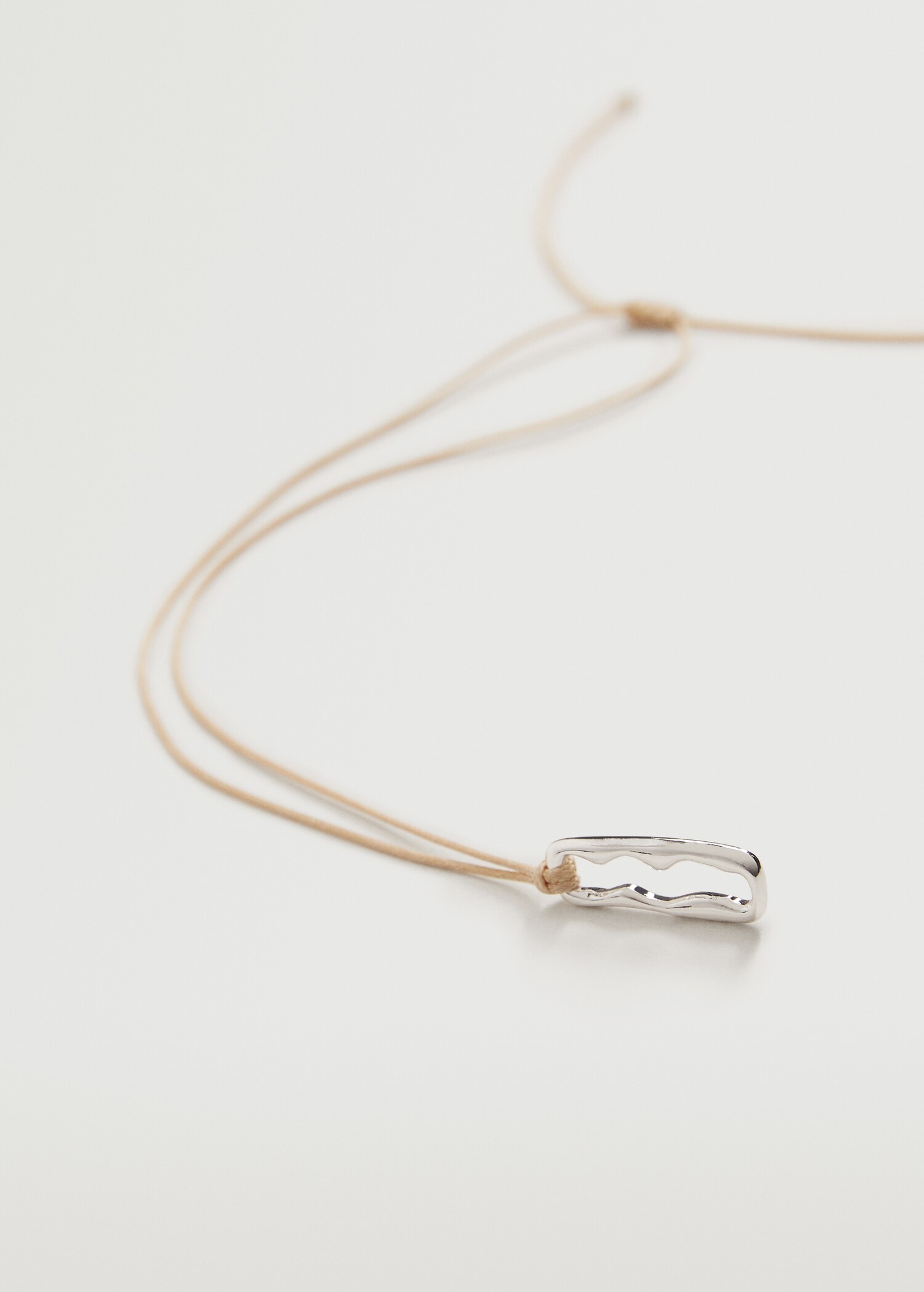 Collar asimétrico relieve - Plano medio