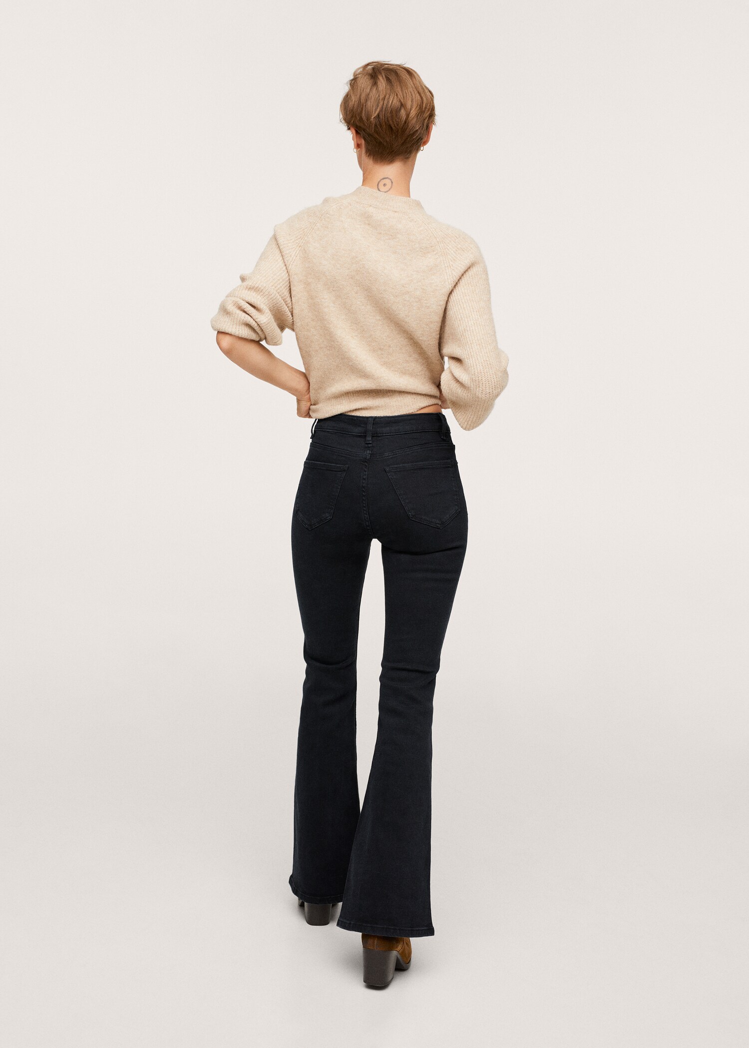 Mid-rise flared jeans - Reverse of the article