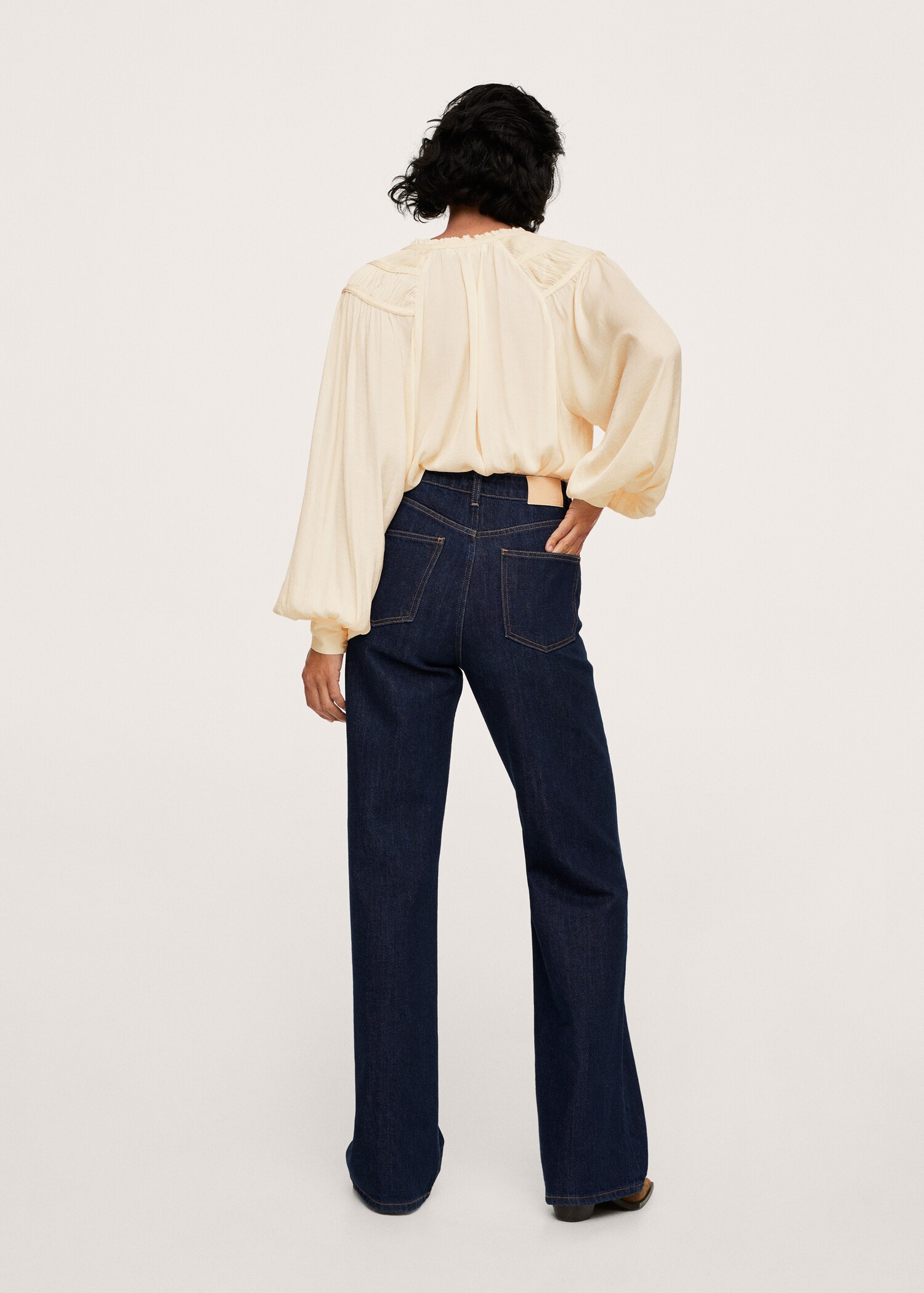 Blusa manga abullonada - Reverso del artículo