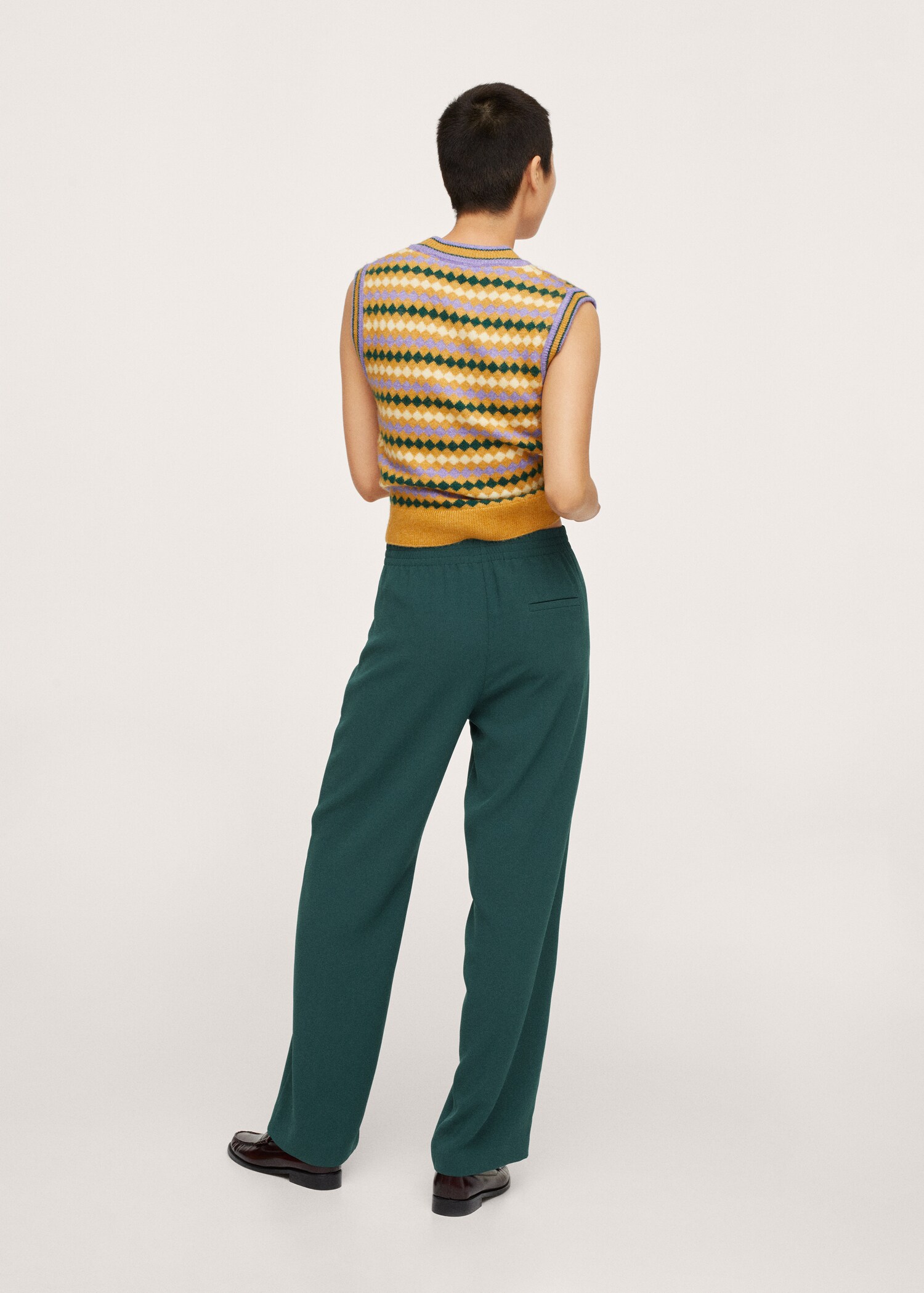 Elastic waist trousers - Reverse of the article