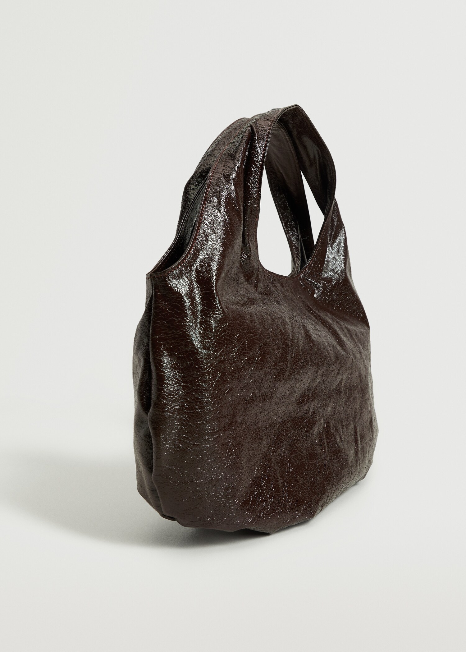 Bolso mano textura - Plano medio
