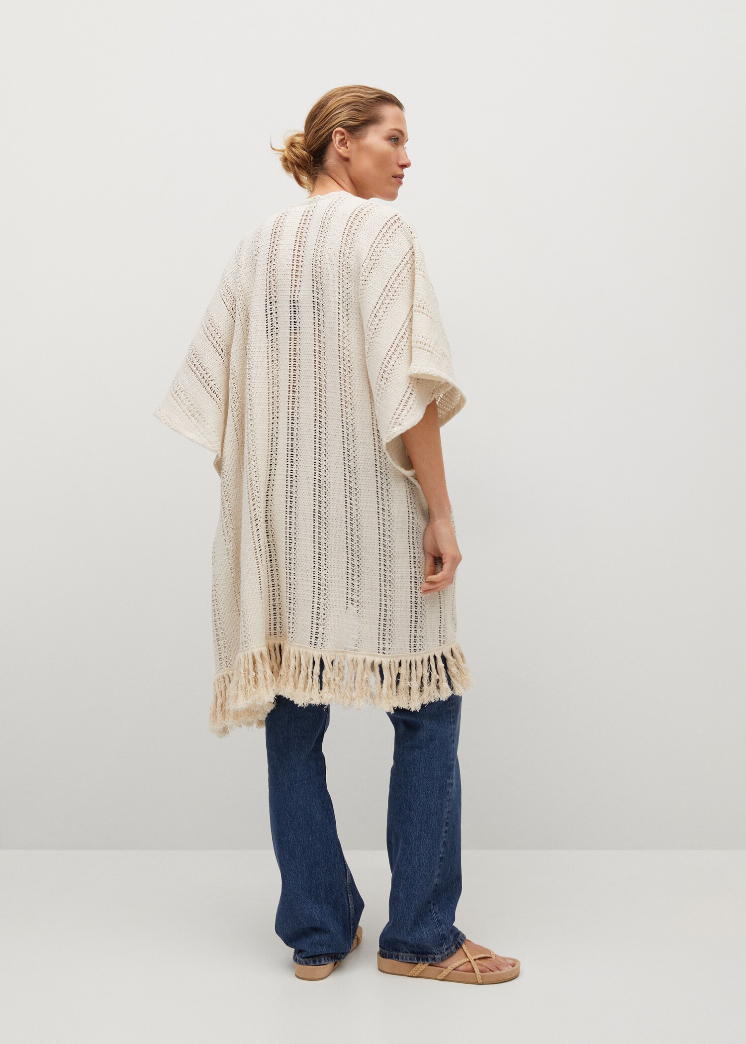 Long openwork caftan - Reverse of the article