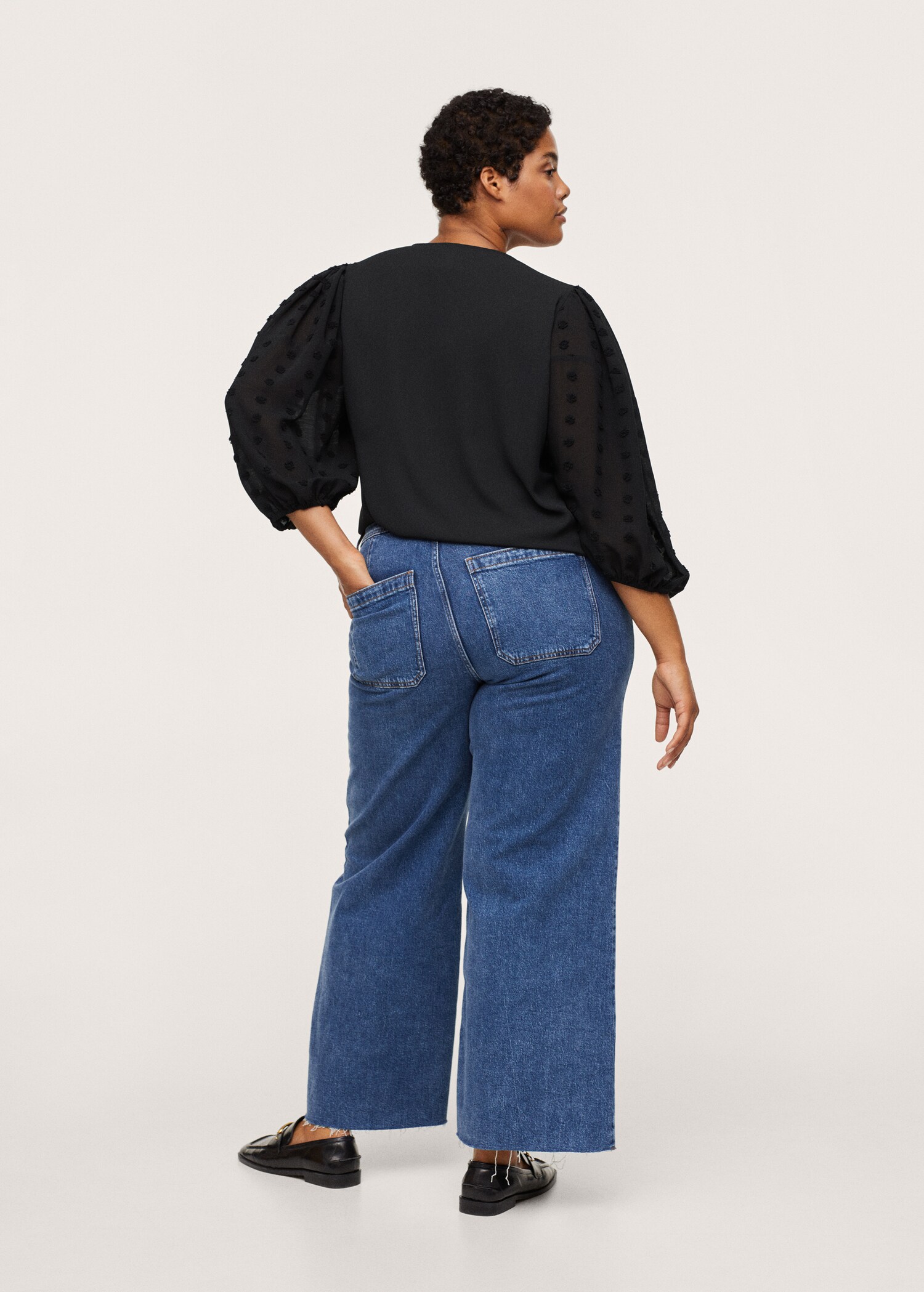 Blusa manga plumeti - Reverso del artículo