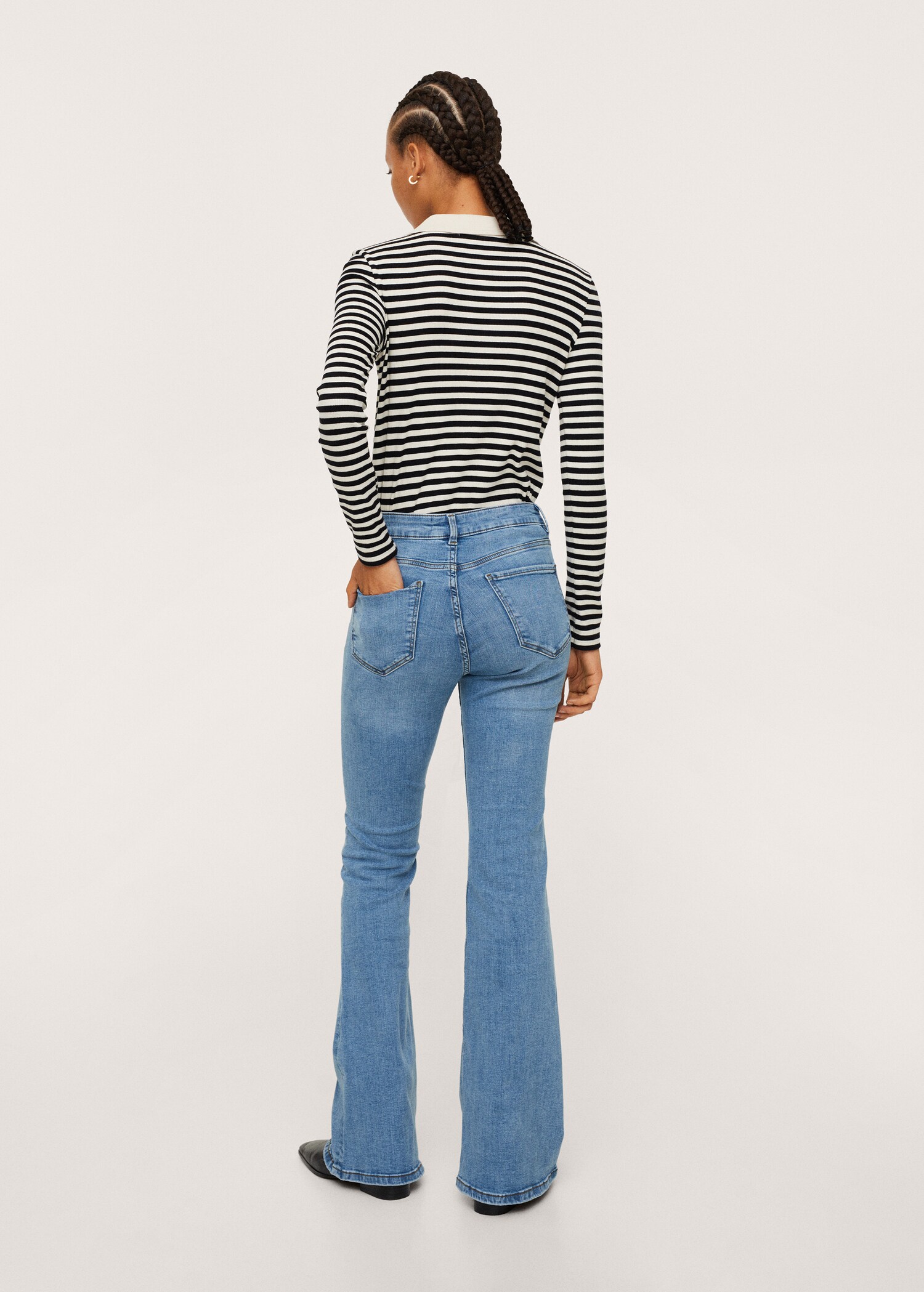 Mid-rise flared jeans - Reverse of the article