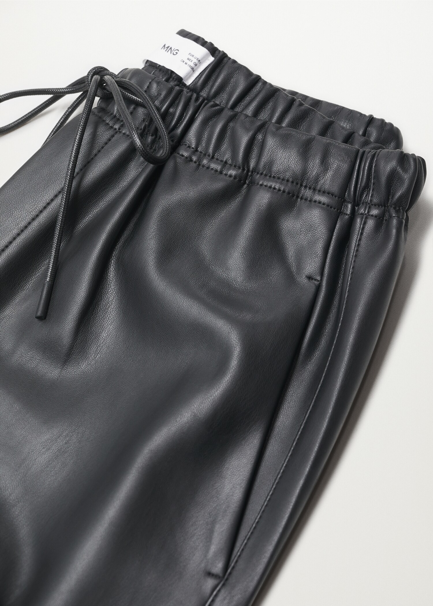 Kalhoty s elastickým pasem koženého vzhledu - Detail zboží 8