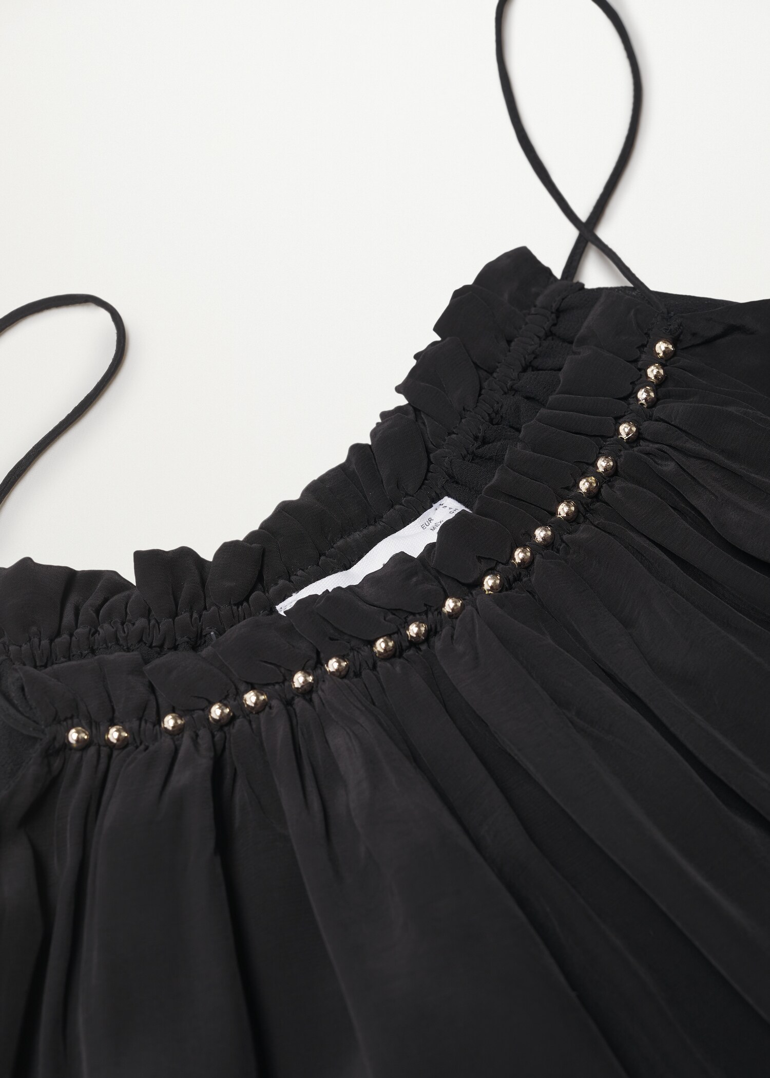 Kleid mit Metall-Applikationen - Detail des Artikels 8