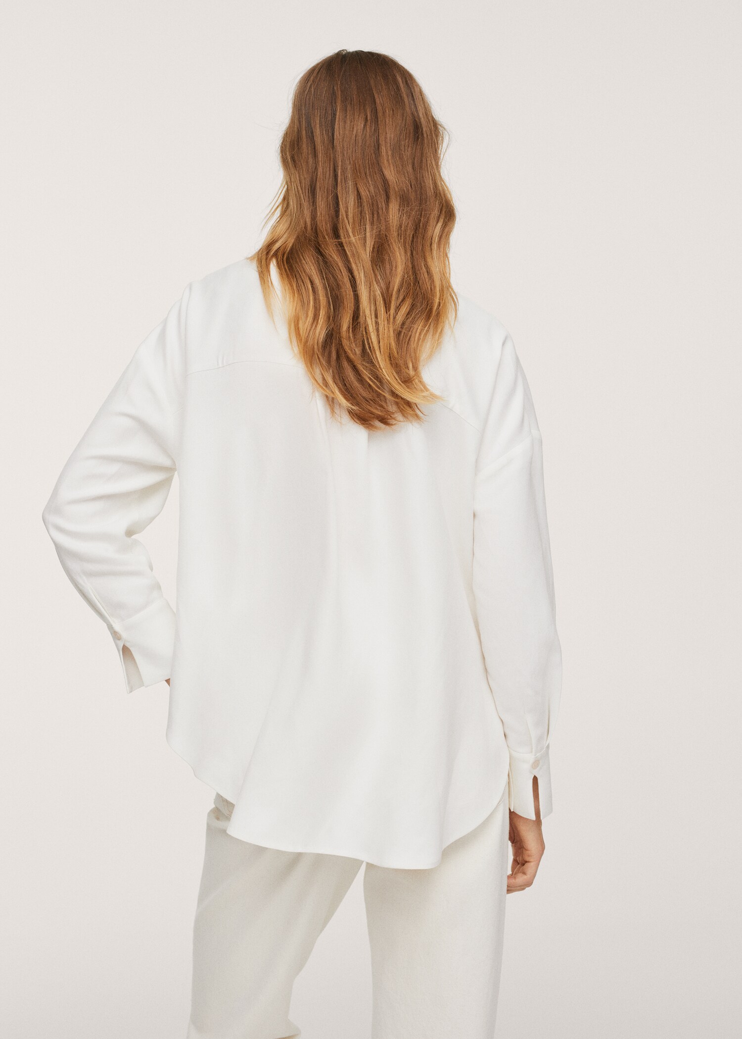 Camisa aberturas laterales - Reverso del artículo