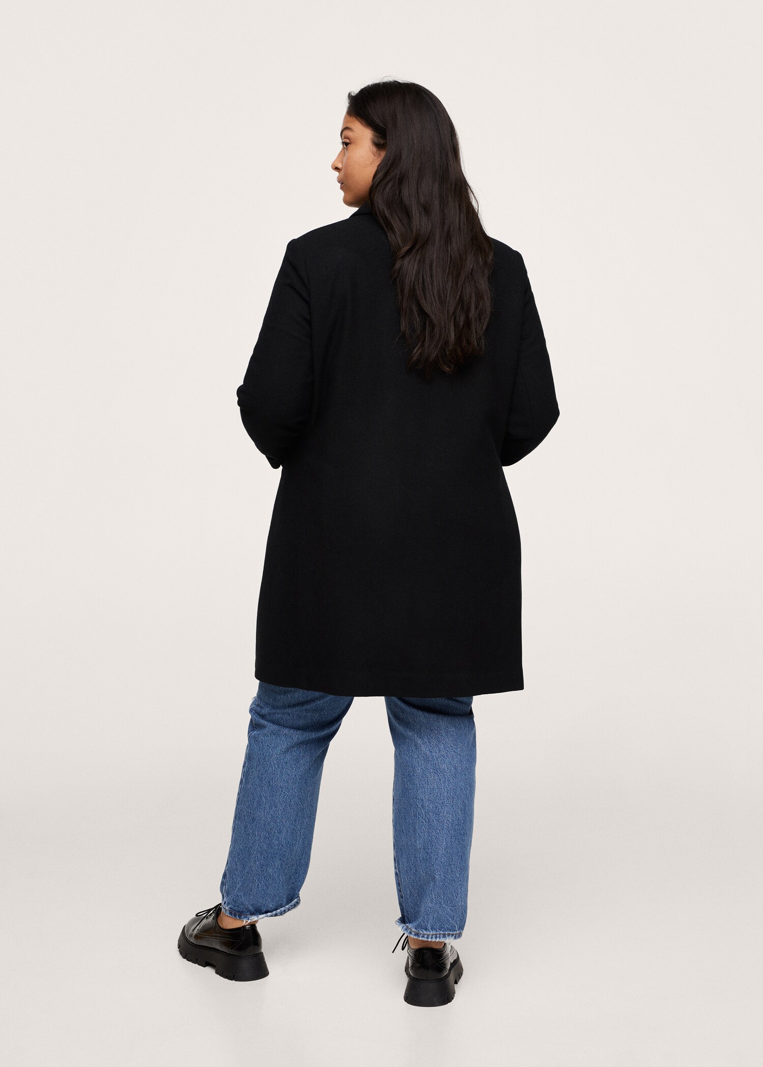 Double-breasted wool coat - Reverse of the article