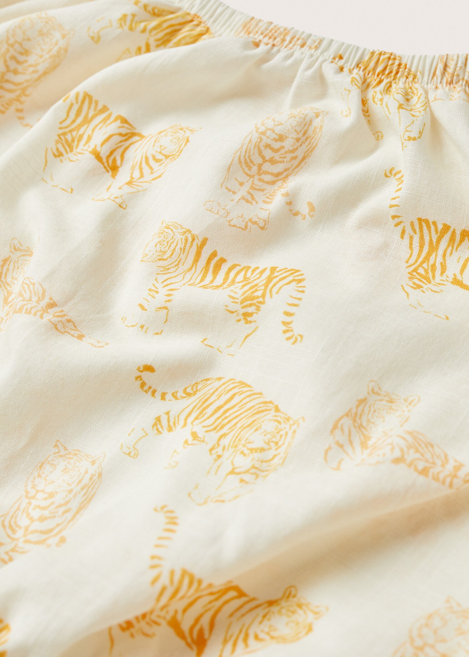 Bluse mit Tigermuster - Detail des Artikels 8
