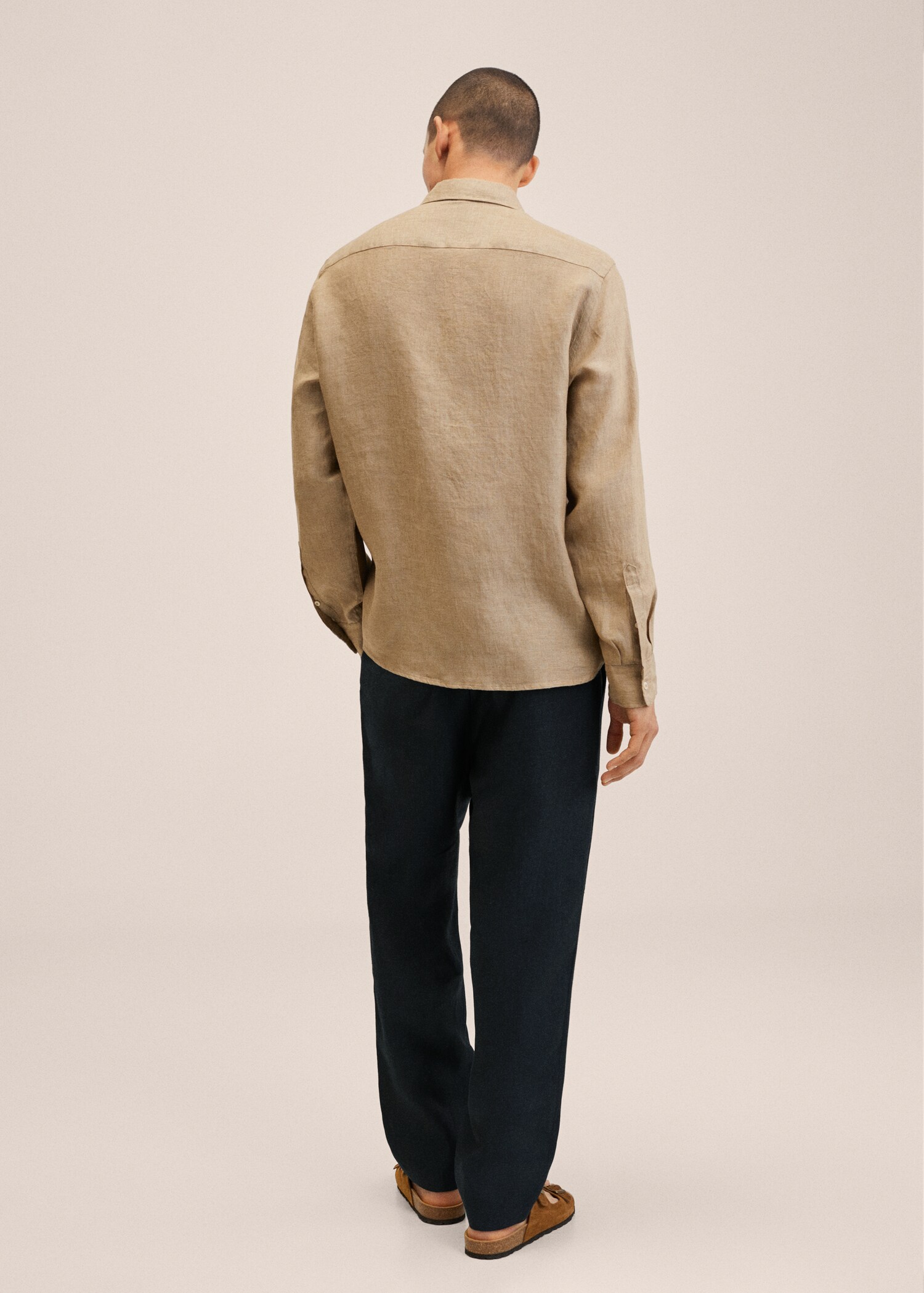 Pleated linen trousers - Reverse of the article