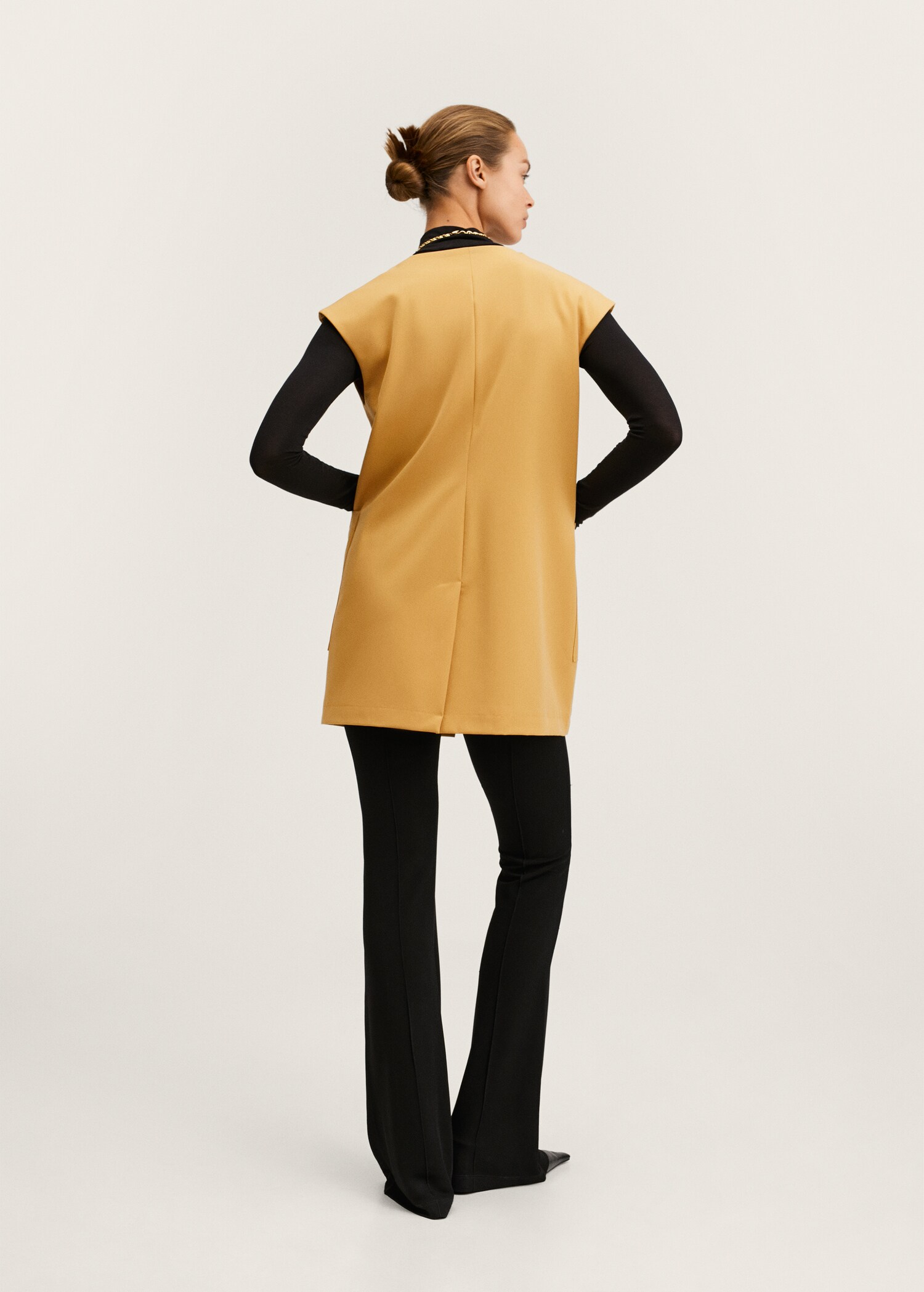 Oversized gilet with pockets - Reverse of the article