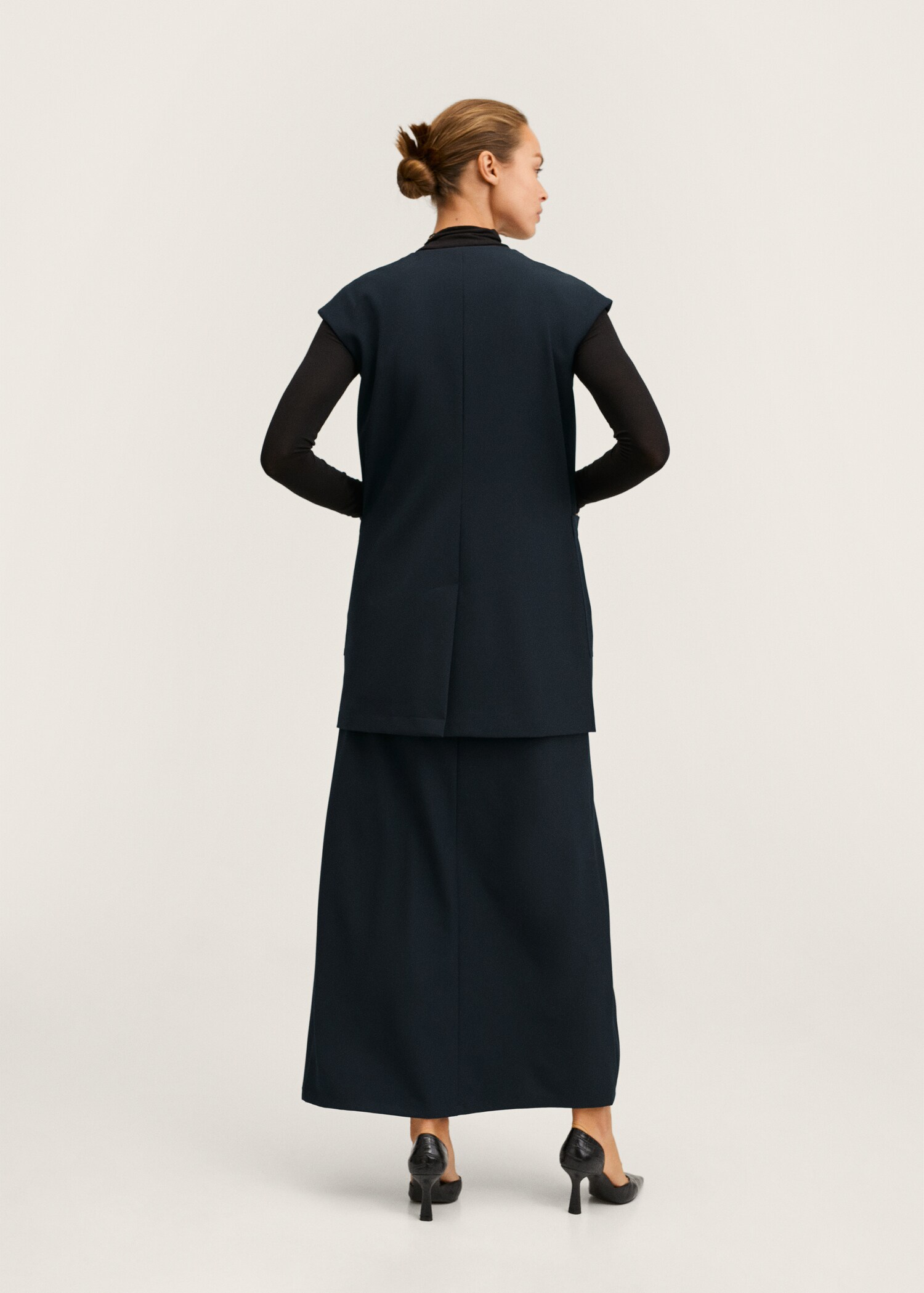Oversized gilet with pockets - Reverse of the article