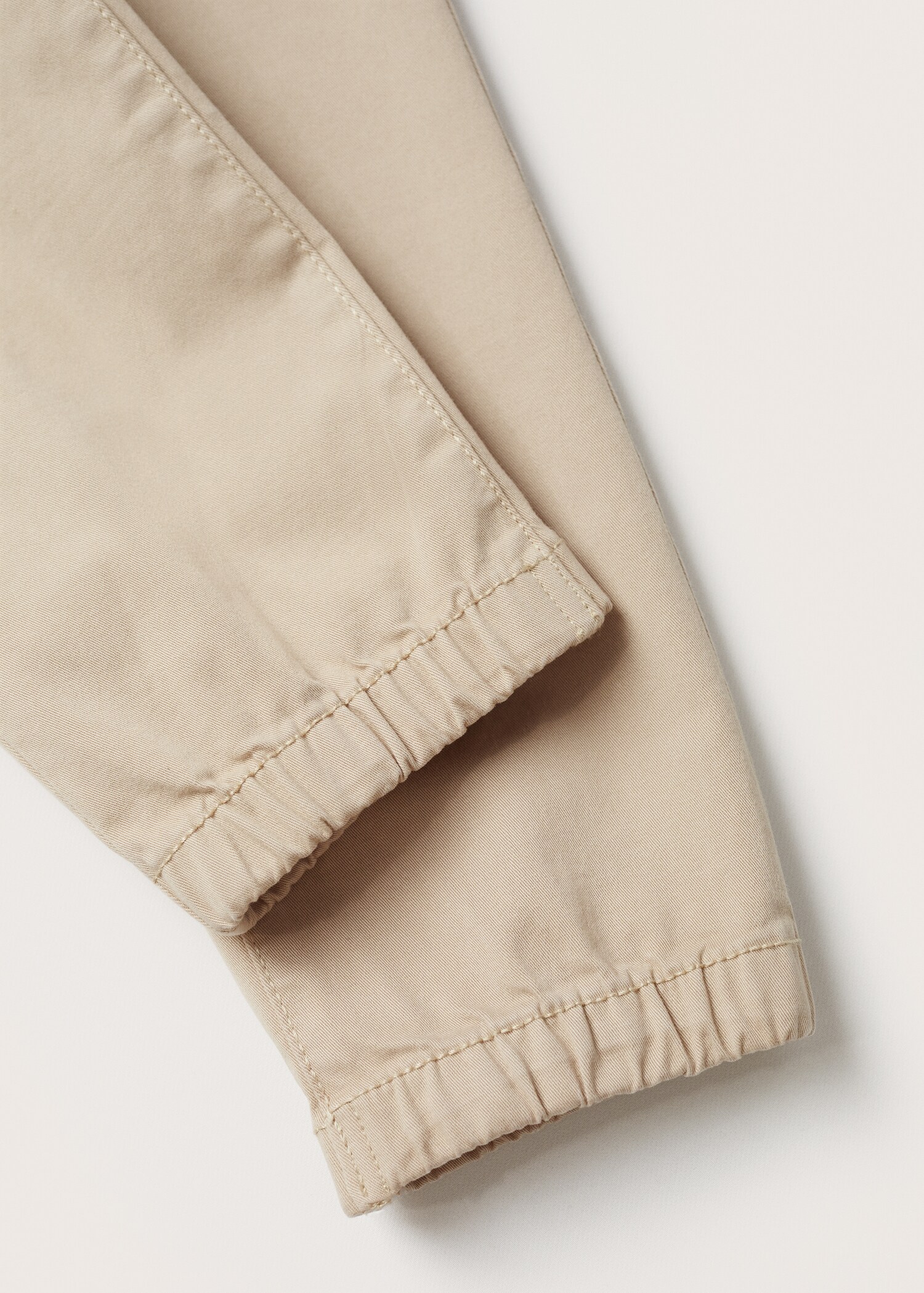 Kalhoty slim fit s pruženkou na lemu - Detail zboží 8