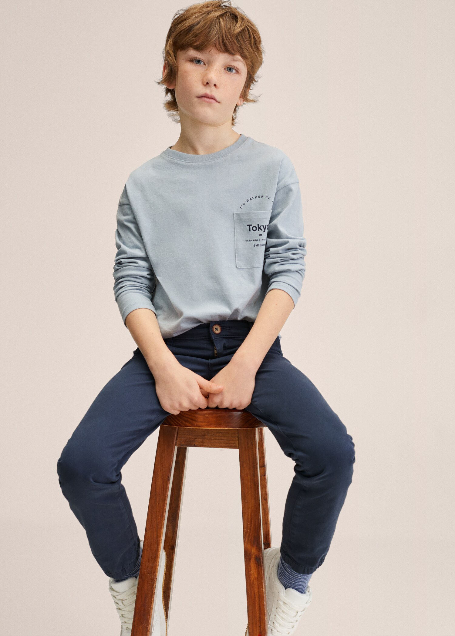 Kalhoty slim fit s pruženkou na lemu - Náhled ve středové rovině