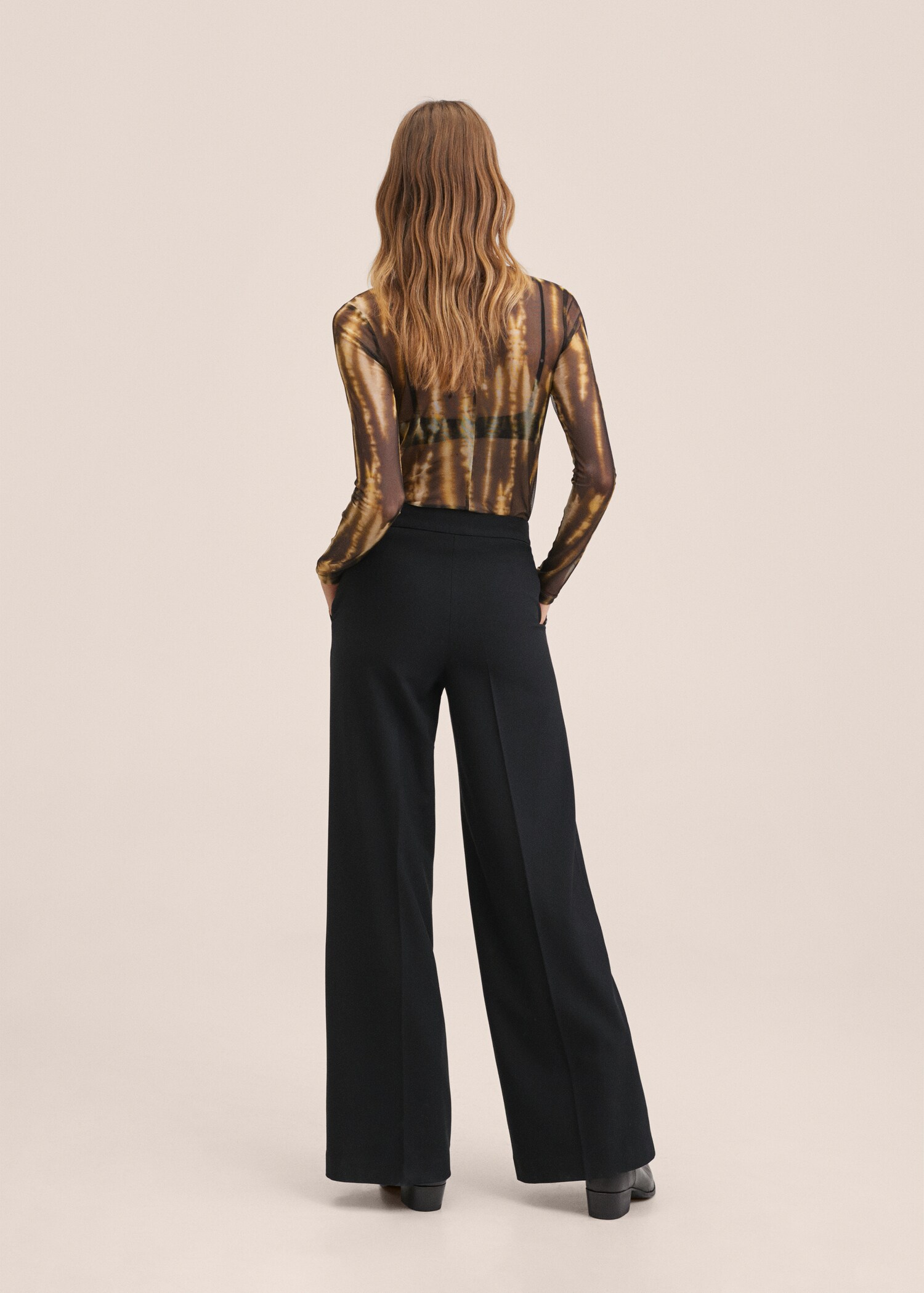 Wideleg trousers with pockets - Reverse of the article