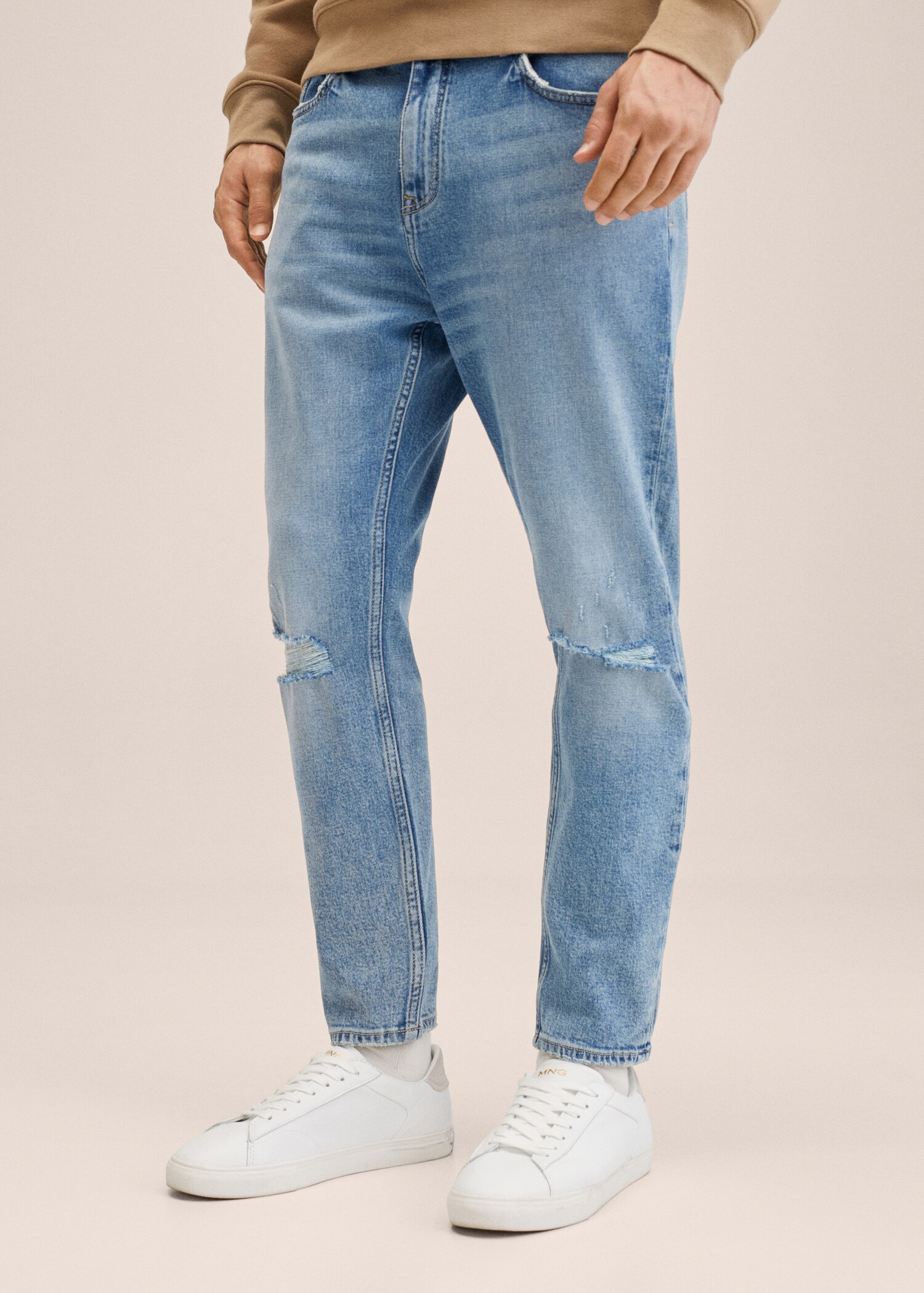 Ripped tapered-fit jeans - Medium plane