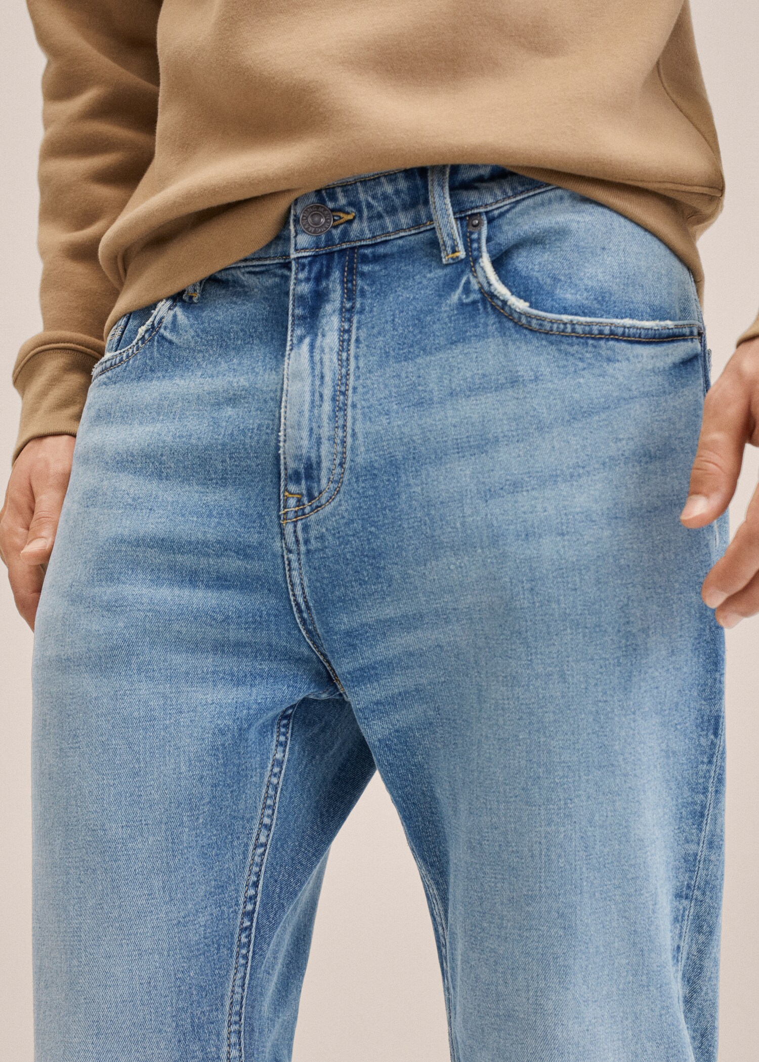 Ripped tapered-fit jeans - Details of the article 1