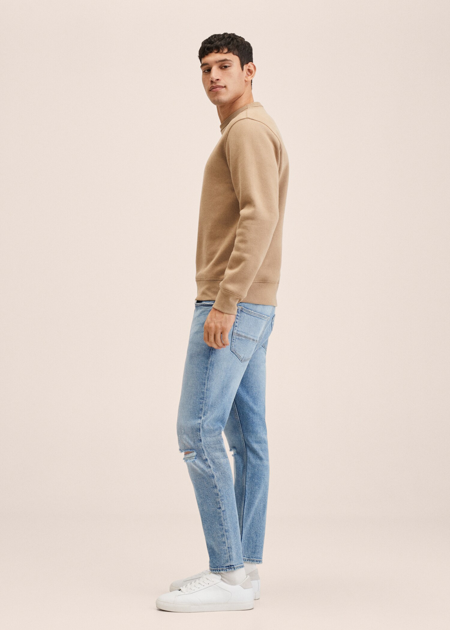 Ripped tapered-fit jeans - Details of the article 2