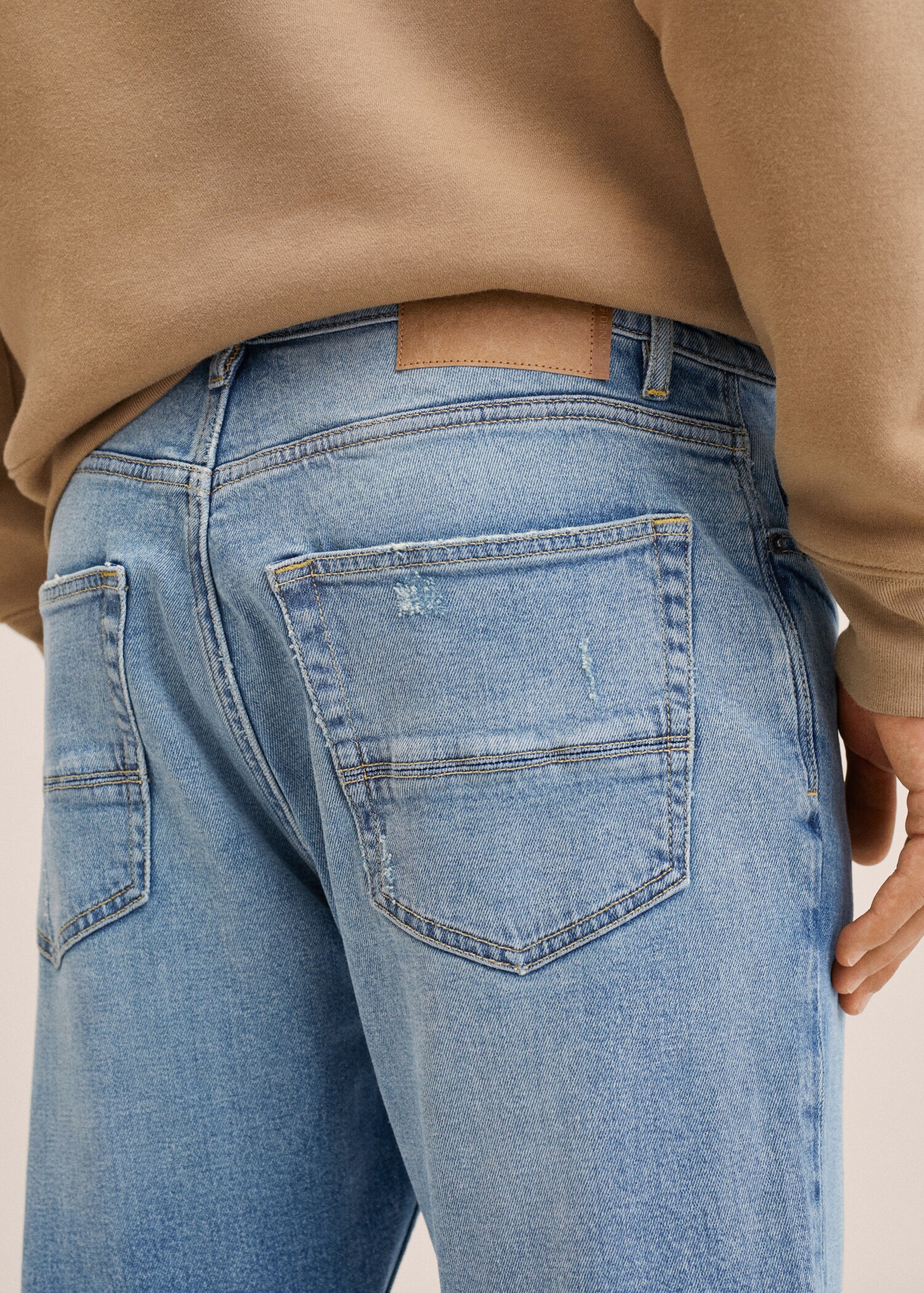 Ripped tapered-fit jeans - Details of the article 3
