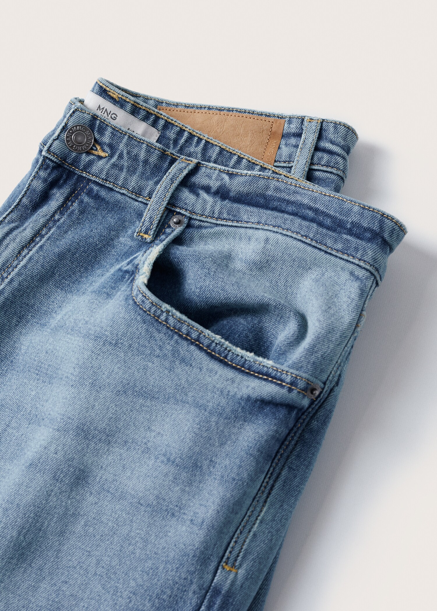 Ripped tapered-fit jeans - Details of the article 7