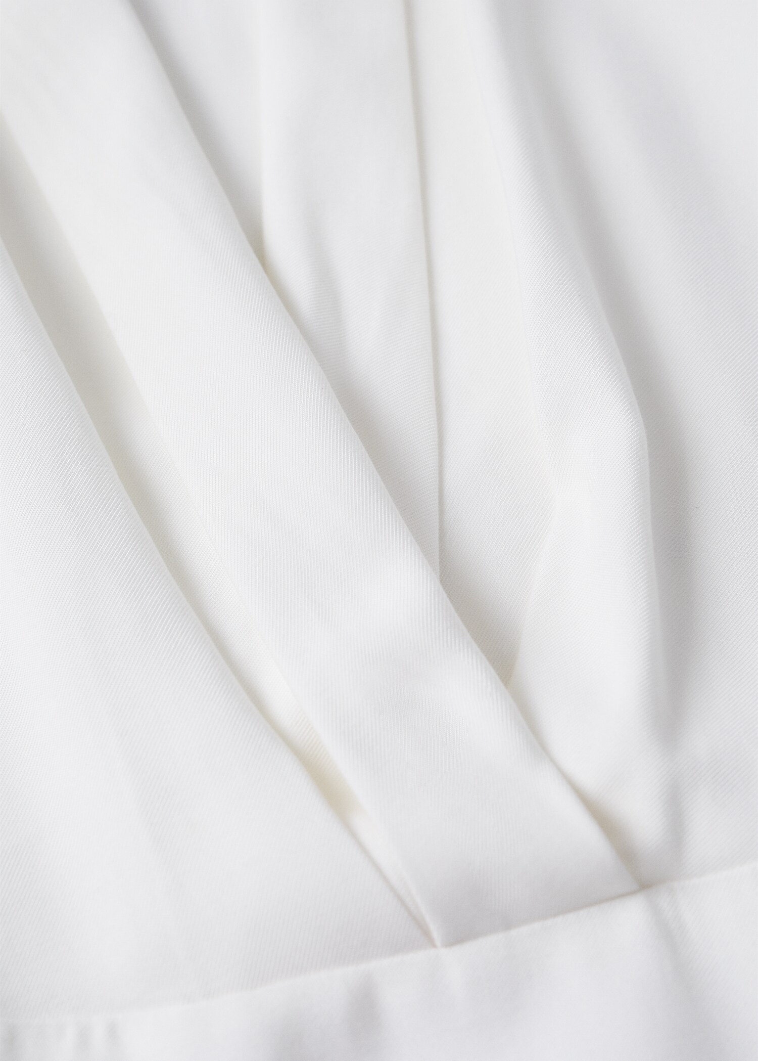 Vestit nit escot creuat - Detall de l'article 8
