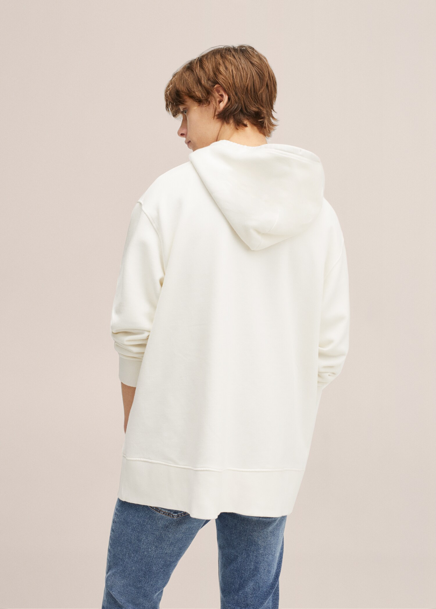 Dessuadora unisex col·lecció T - Revers de l'article