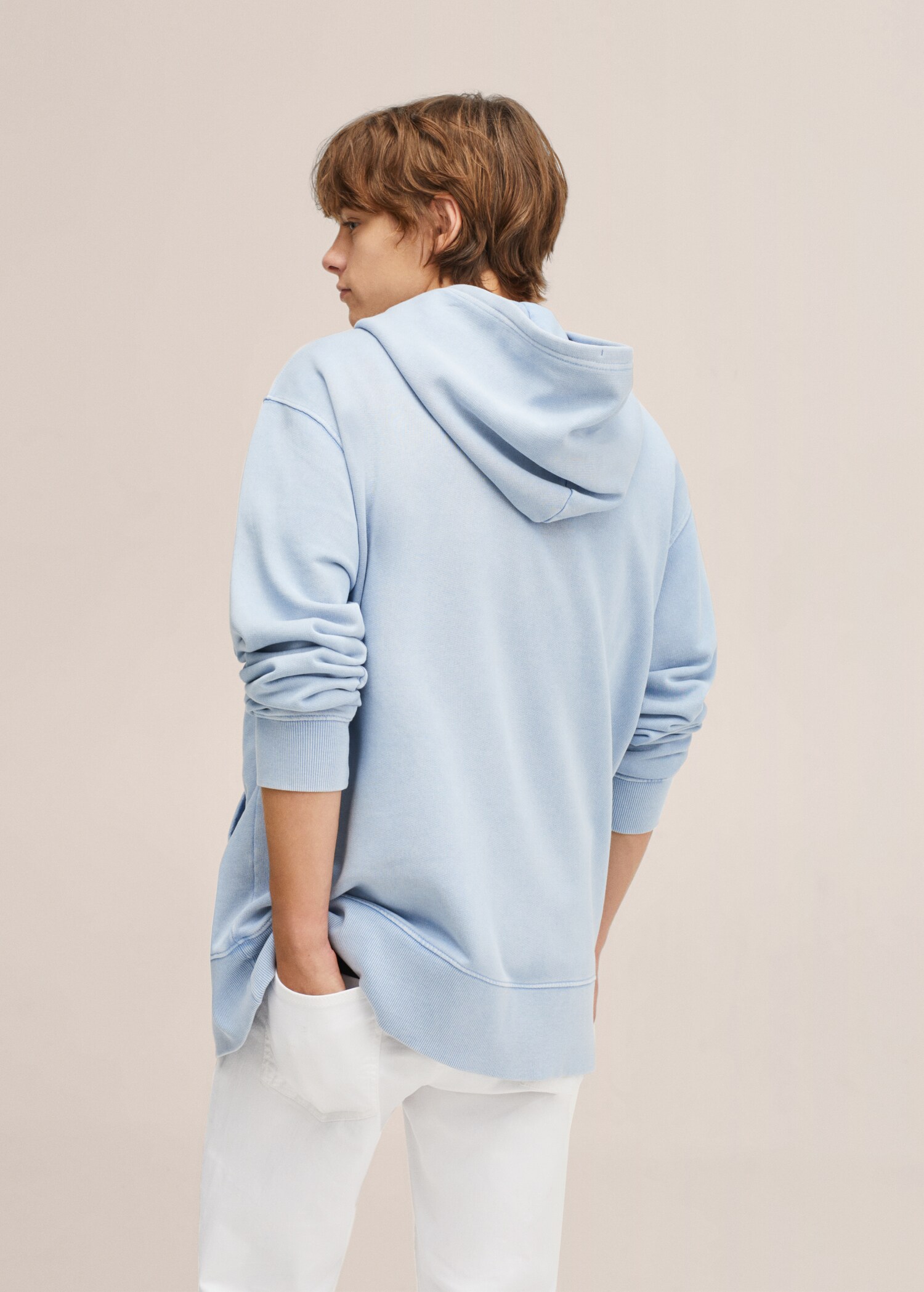 Dessuadora unisex col·lecció T - Revers de l'article