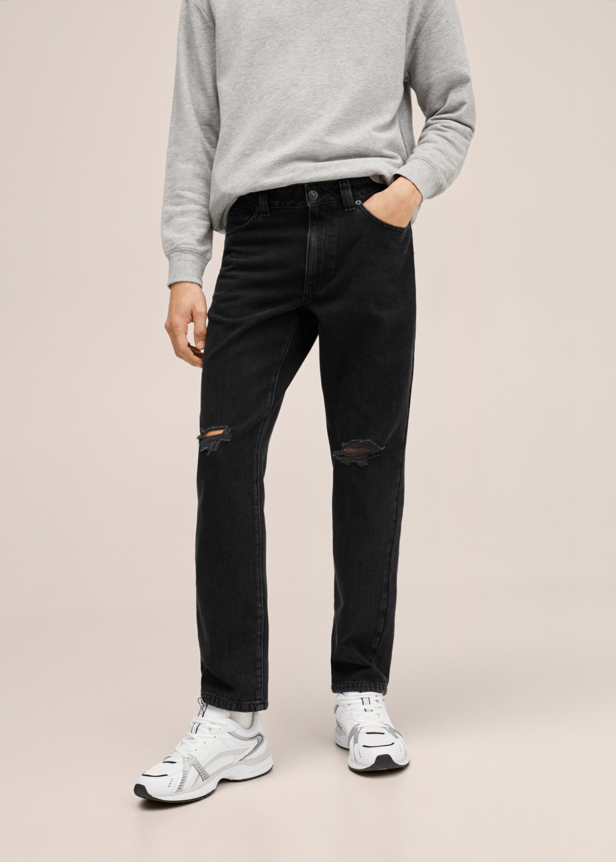 Slim-fit jeans with ripped detail - Details of the article 1
