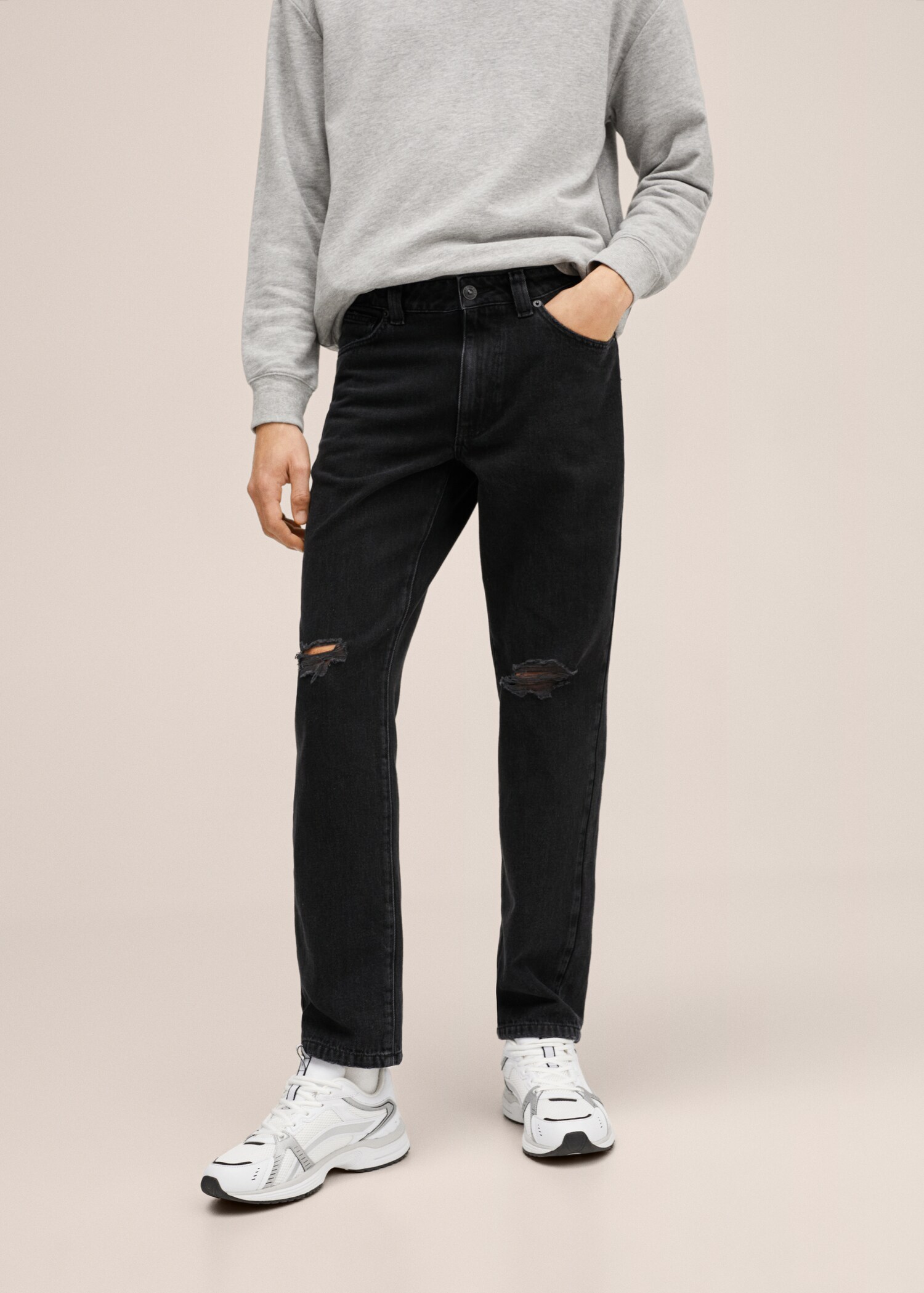 Slim-fit jeans with ripped detail - Details of the article 1