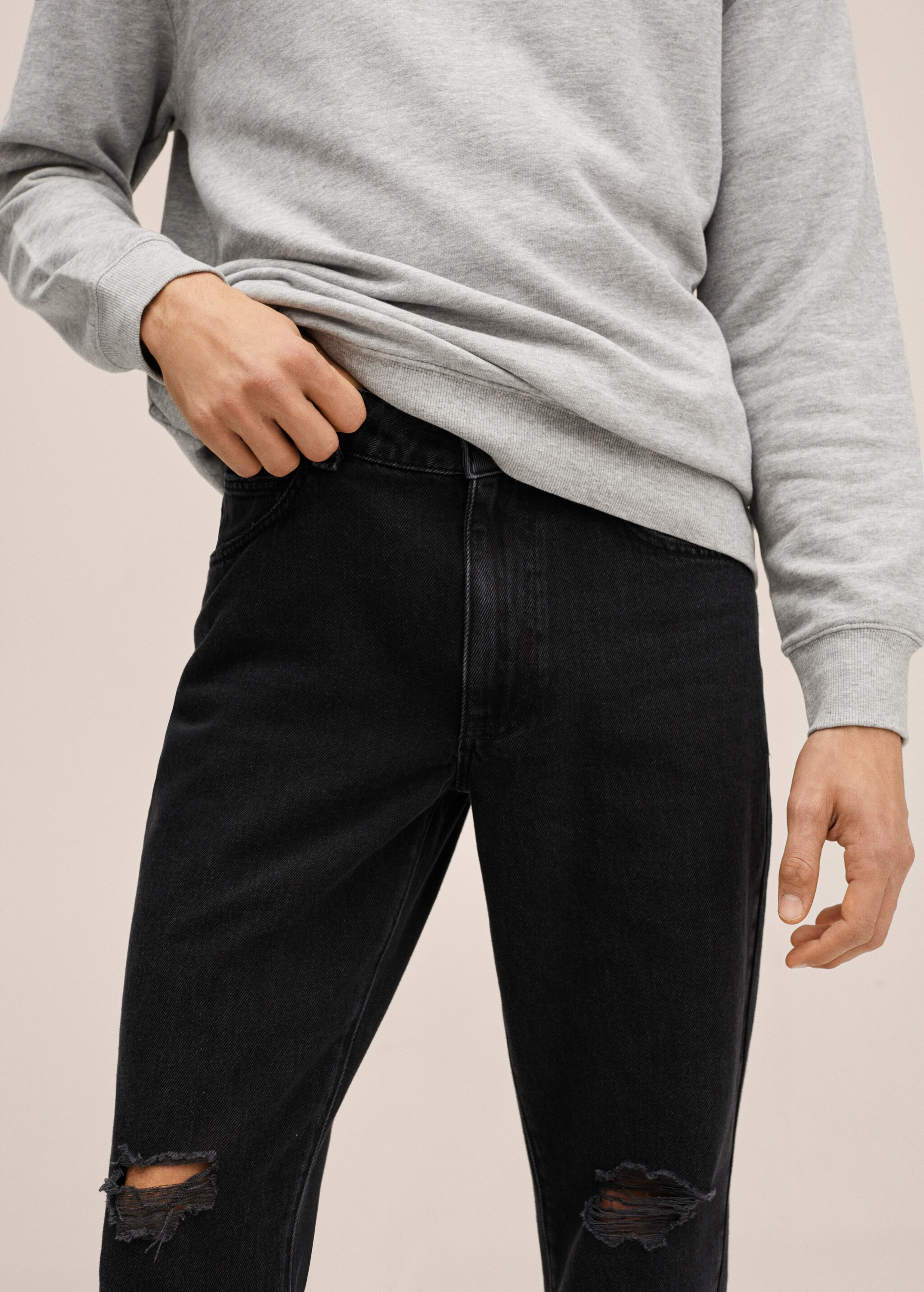 Slim-fit jeans with ripped detail - Details of the article 2