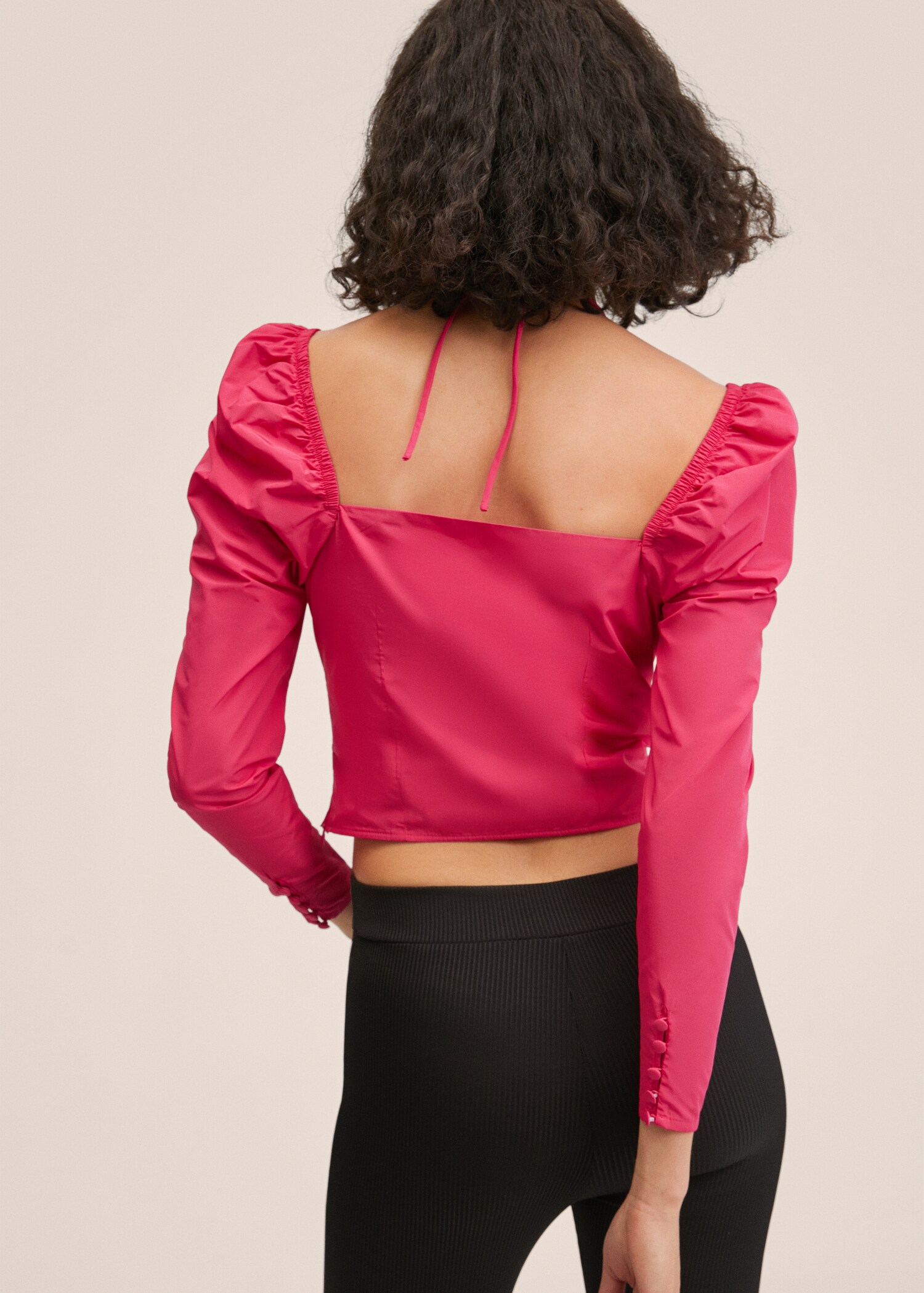 Blusa crop maniche a palloncino - Retro dell'articolo