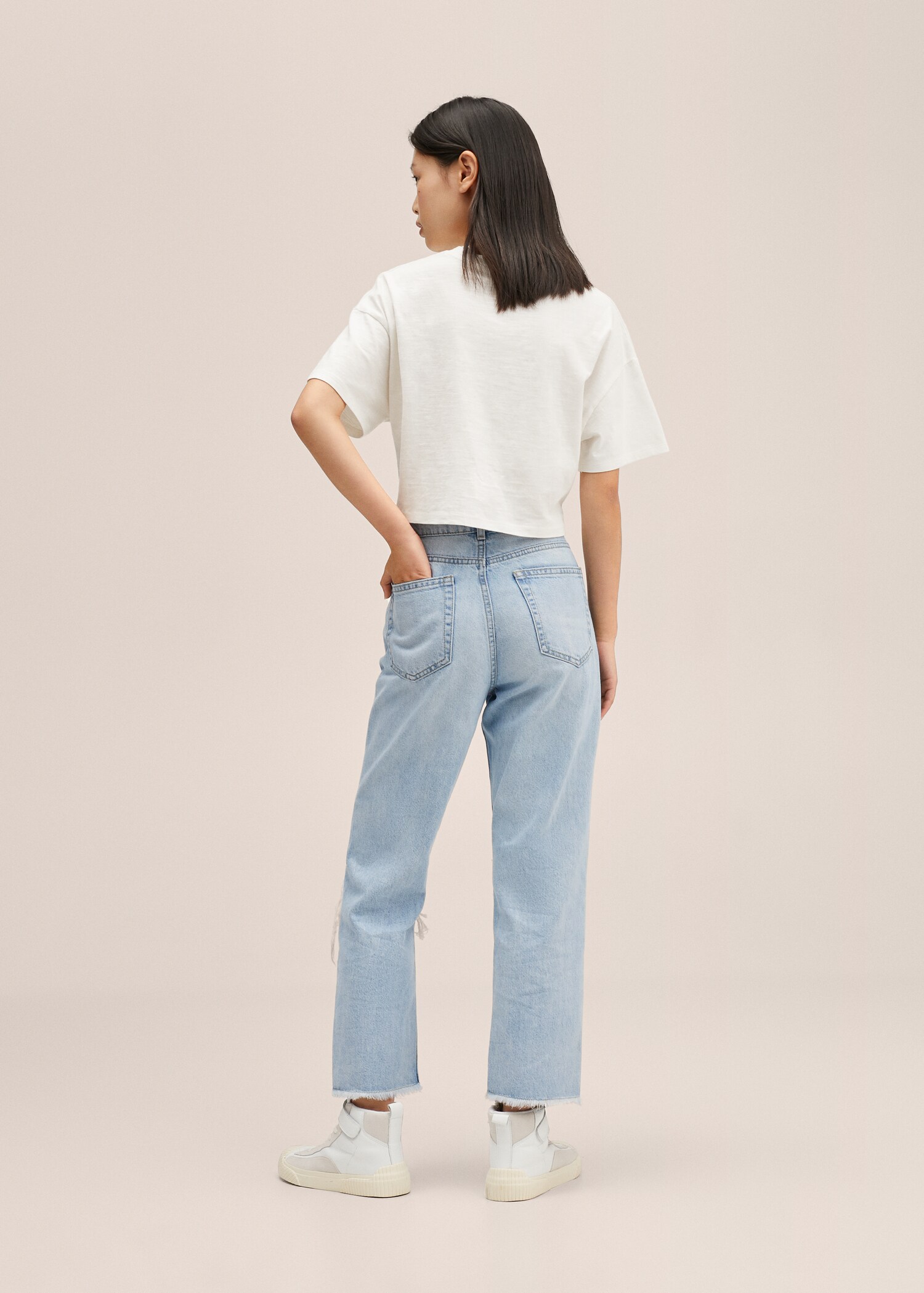 Jeans strappi decorativi - Retro dell'articolo