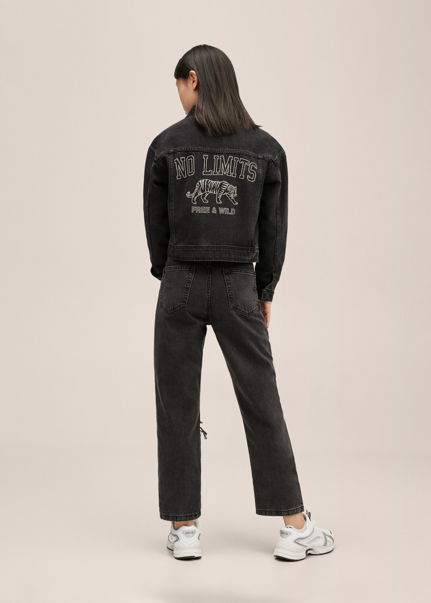 Jeans strappi decorativi - Retro dell'articolo