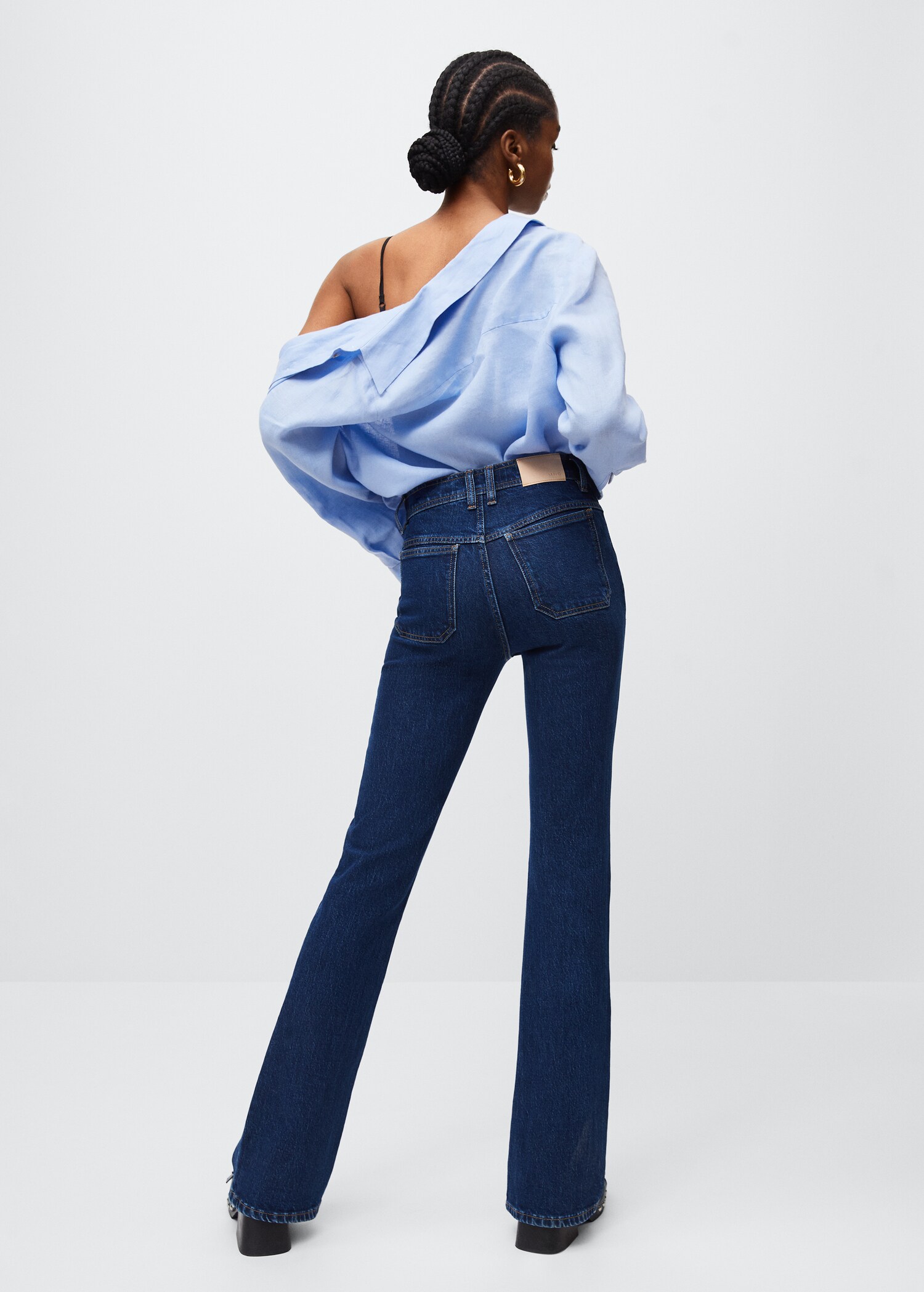 Flared jeans with pocket - Reverse of the article