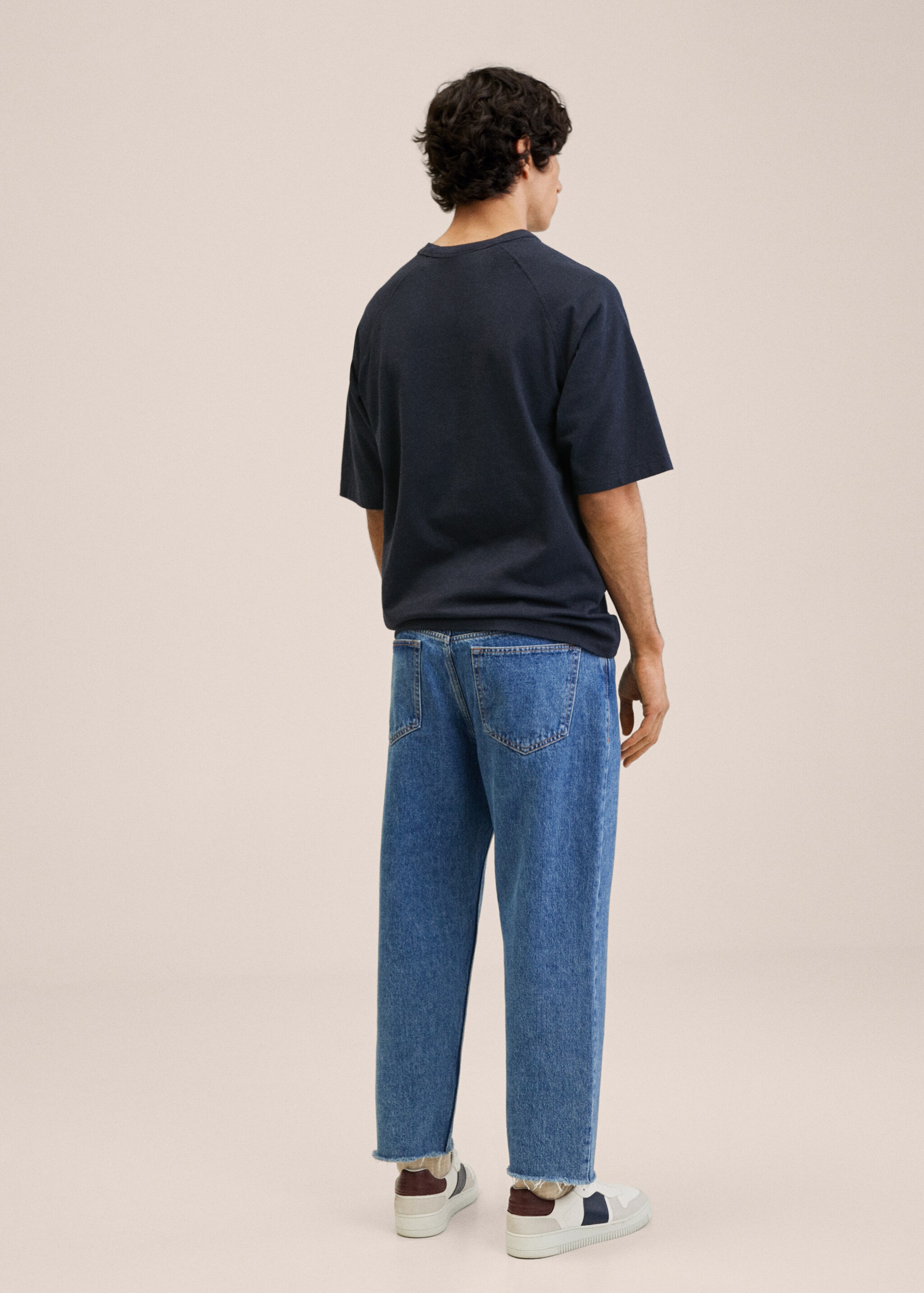 Tapered loose-fit cropped jeans  - Reverse of the article