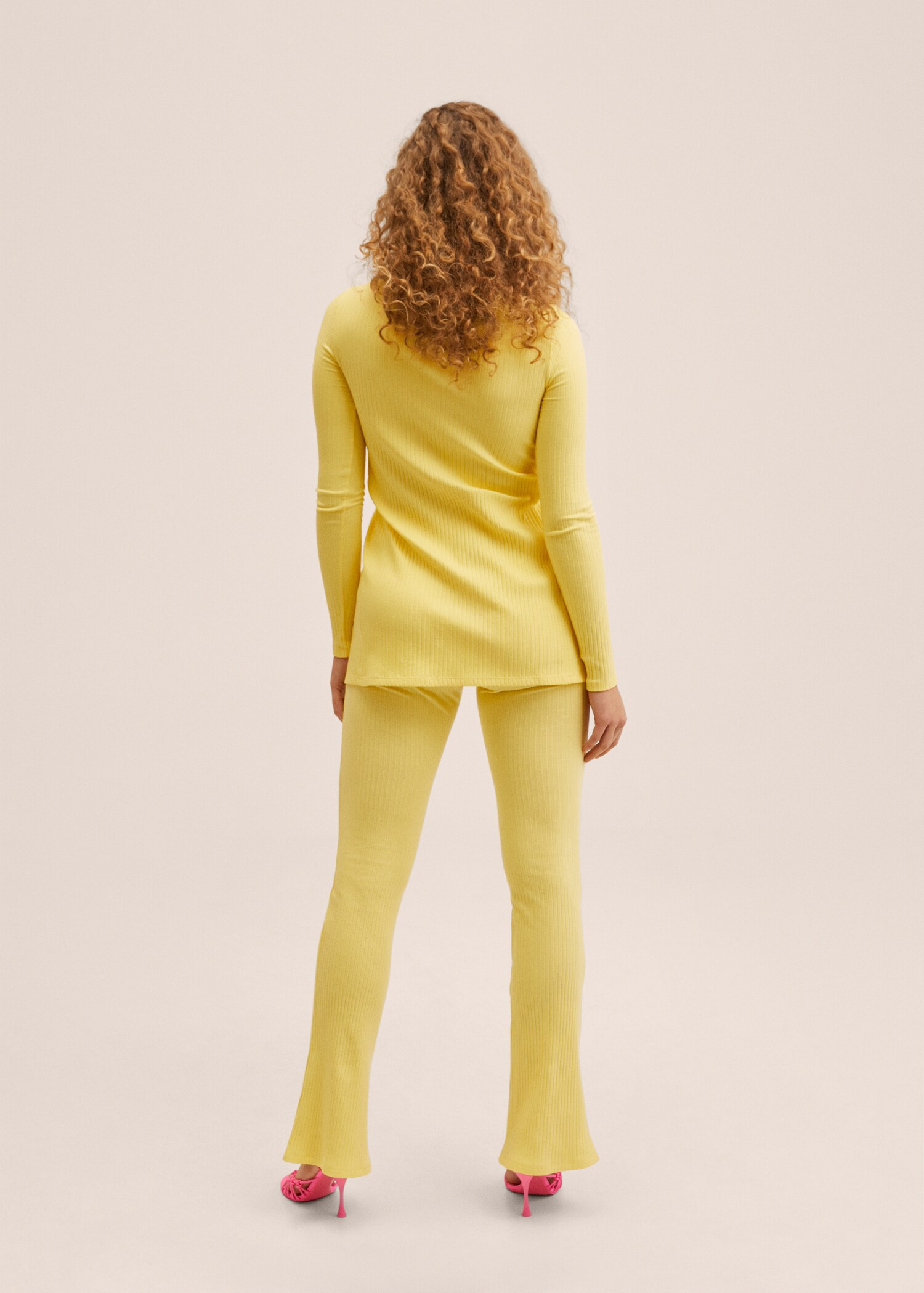 Side slit knit pants - Reverse of the article