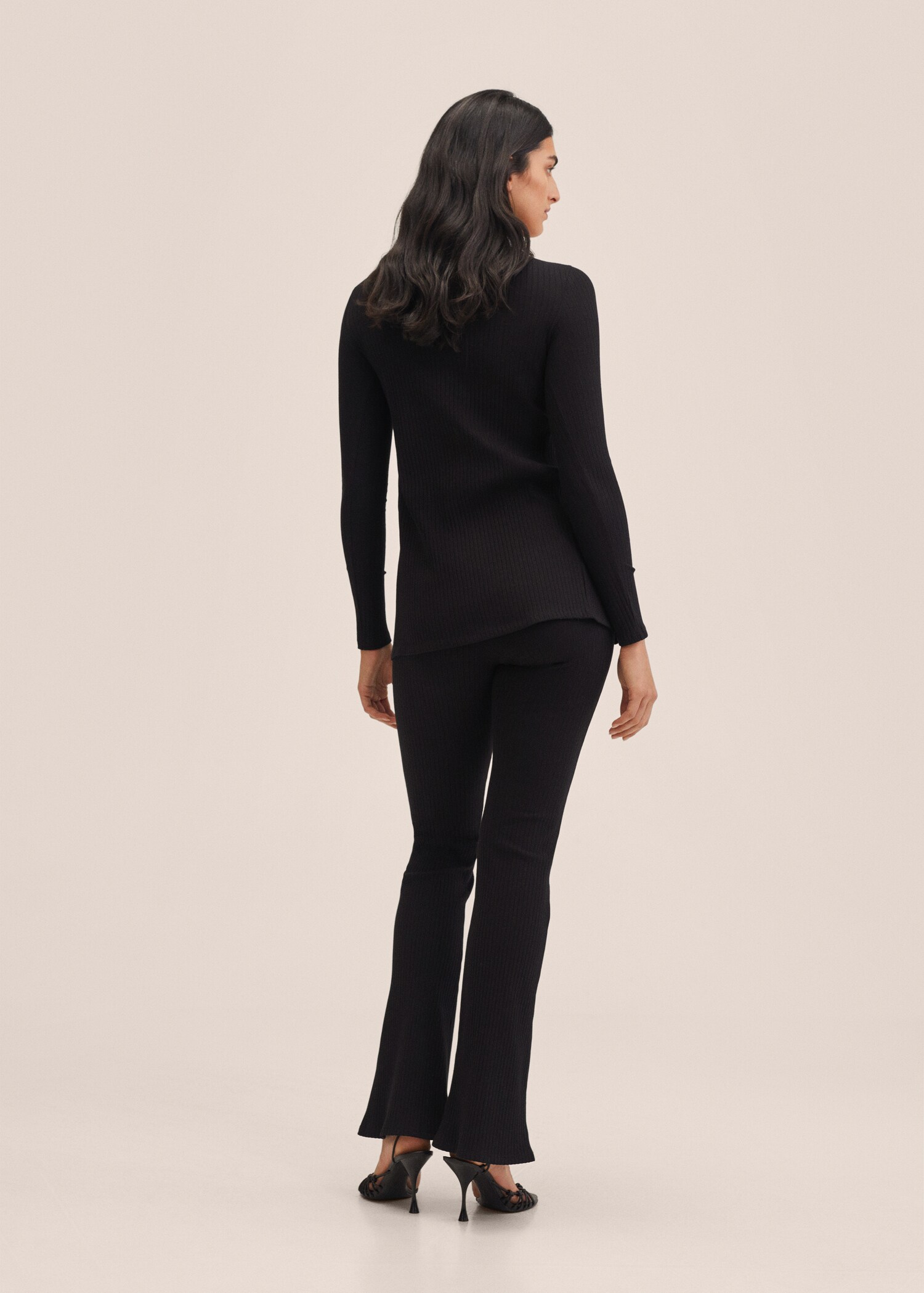 Side slit knit pants - Reverse of the article