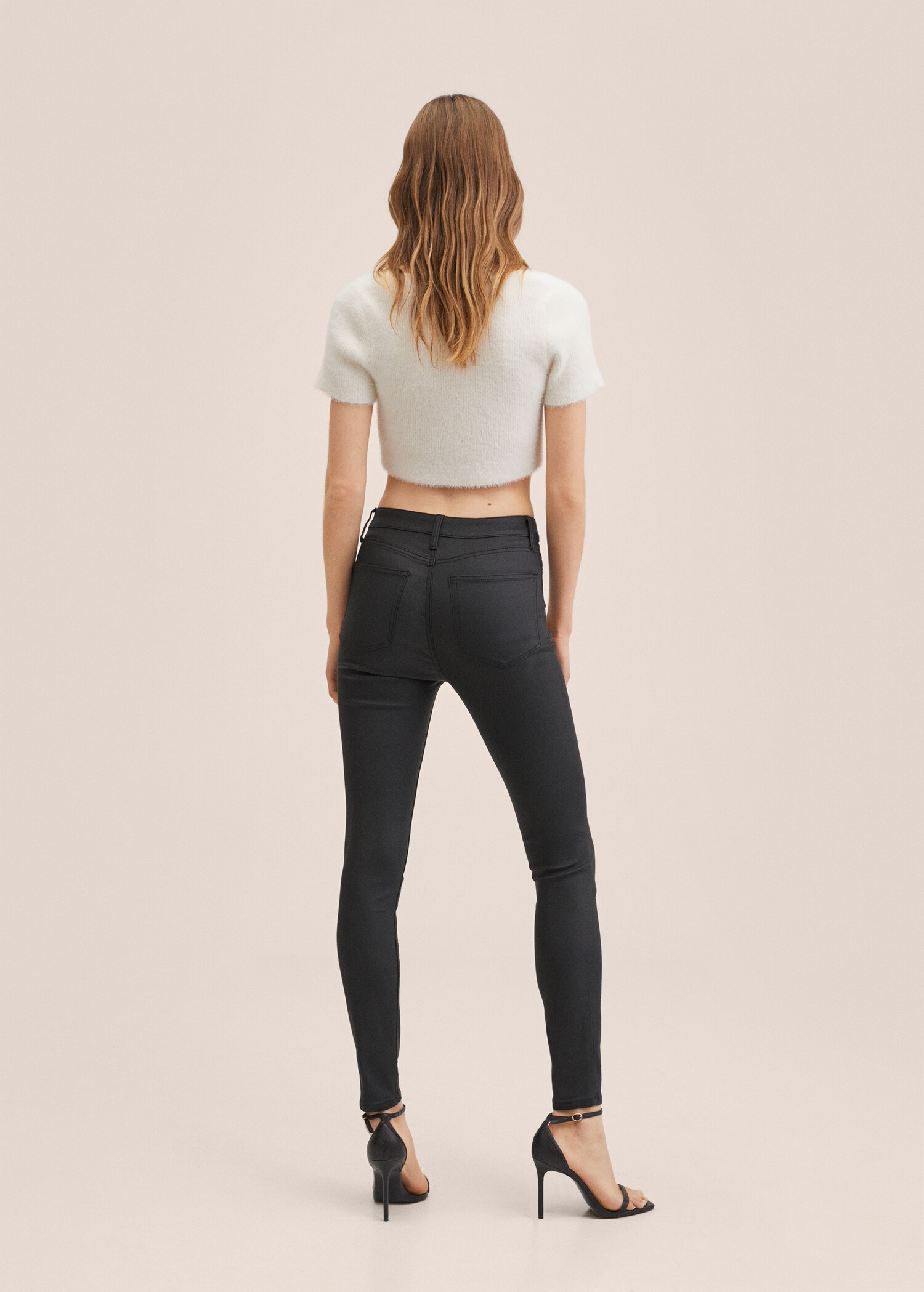 Jeans skinny encerados - Reverso del artículo