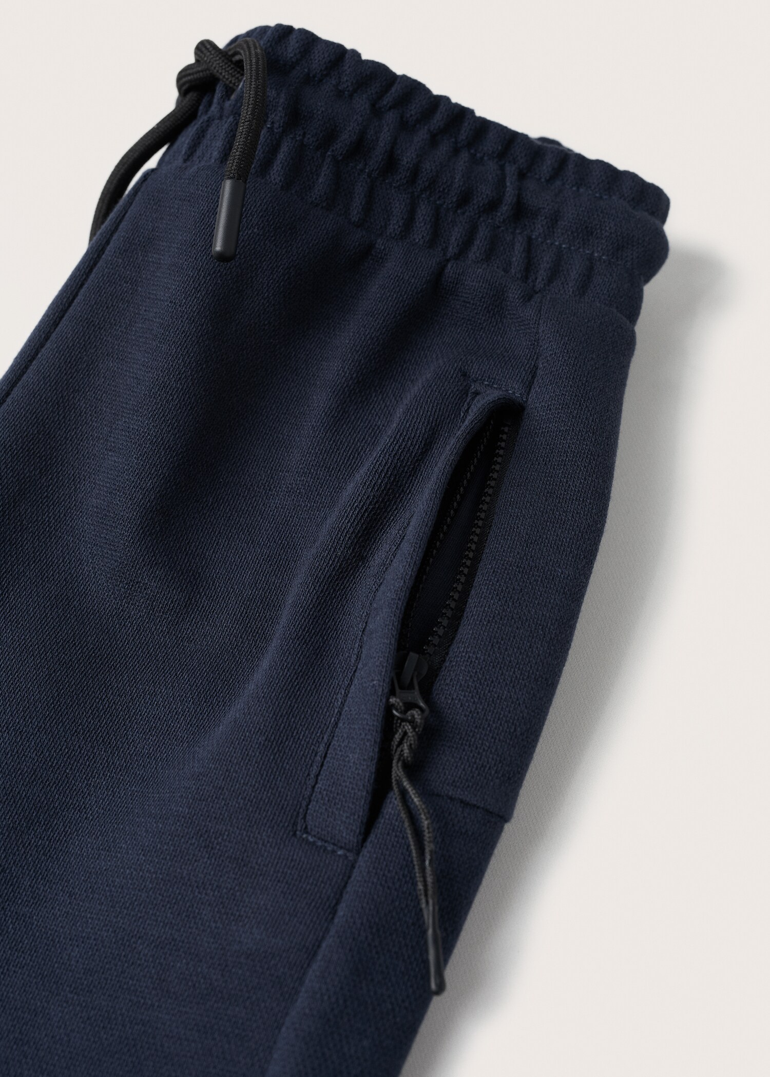 Kalhoty jogger s kapsami a zipem - Detail zboží 8