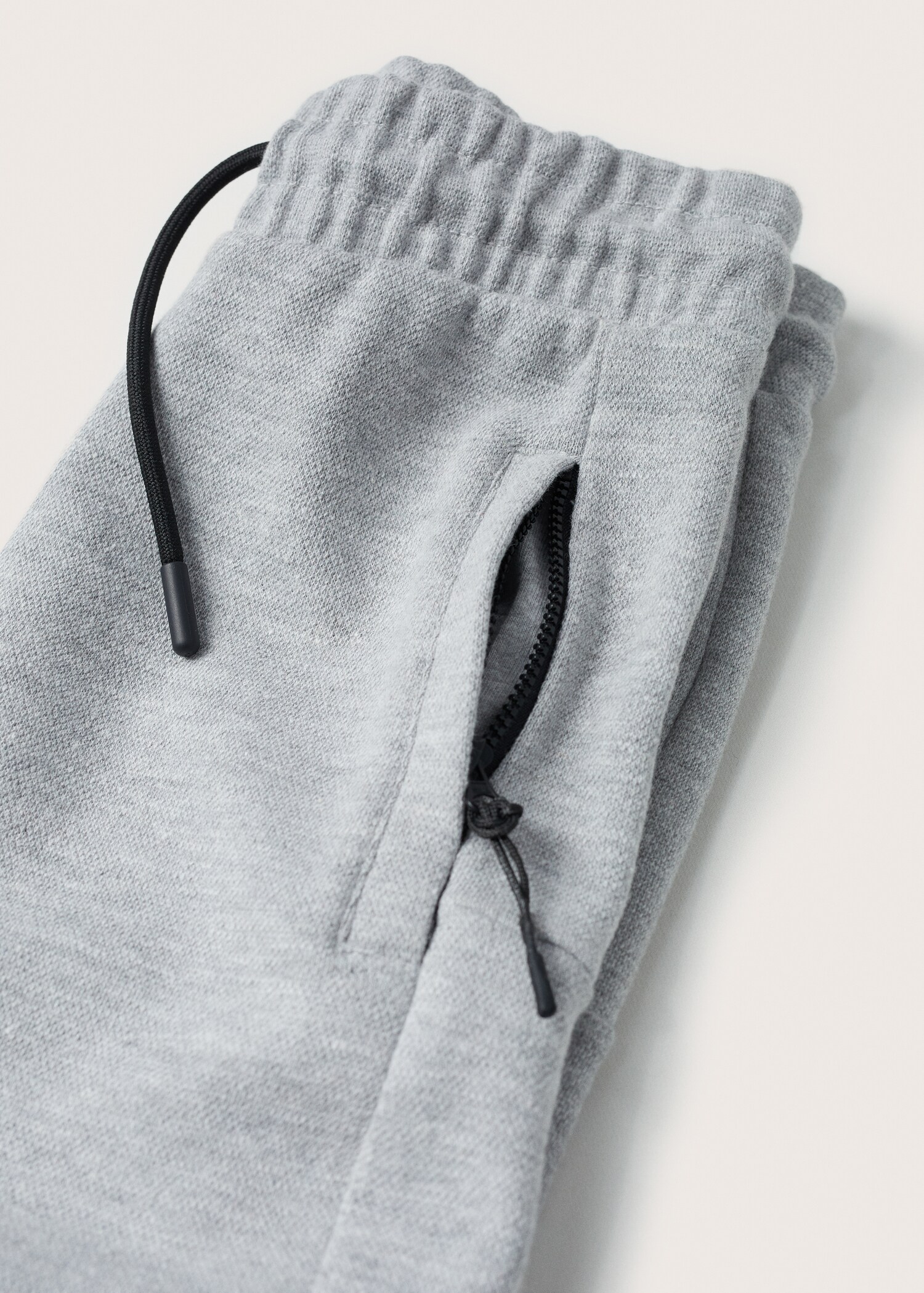 Kalhoty jogger s kapsami a zipem - Detail zboží 8