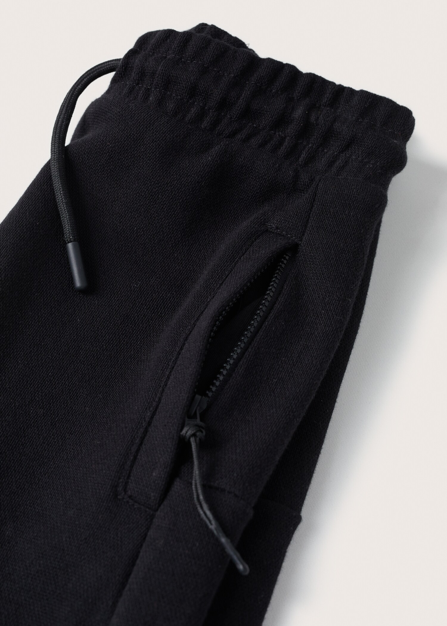 Kalhoty jogger s kapsami a zipem - Detail zboží 8
