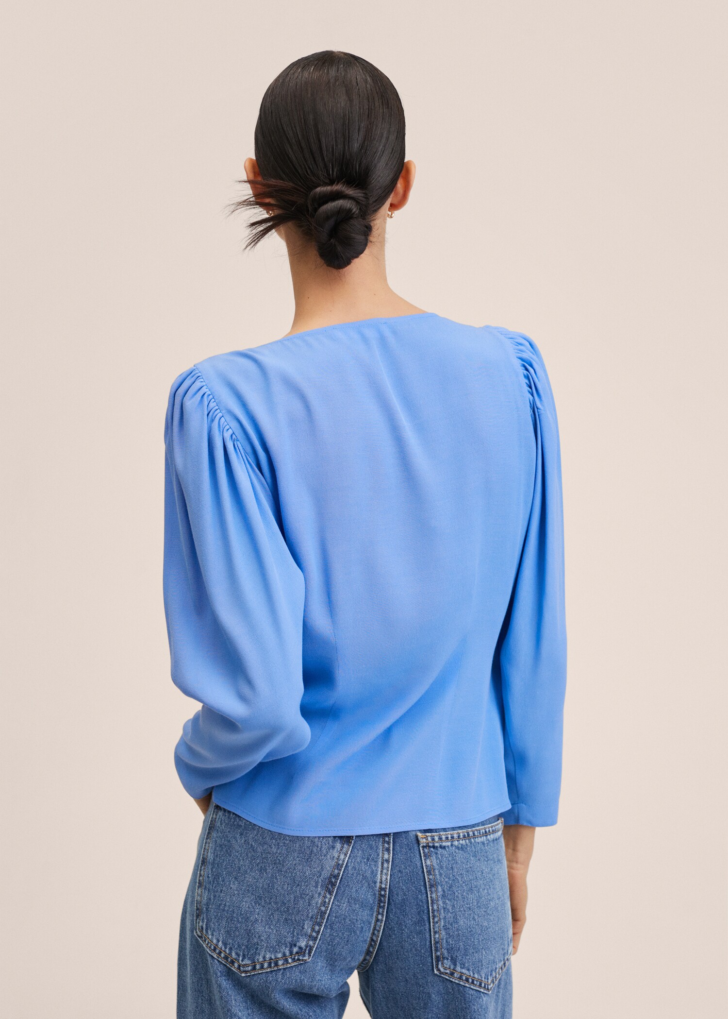 Buttoned wrap blouse - Reverse of the article