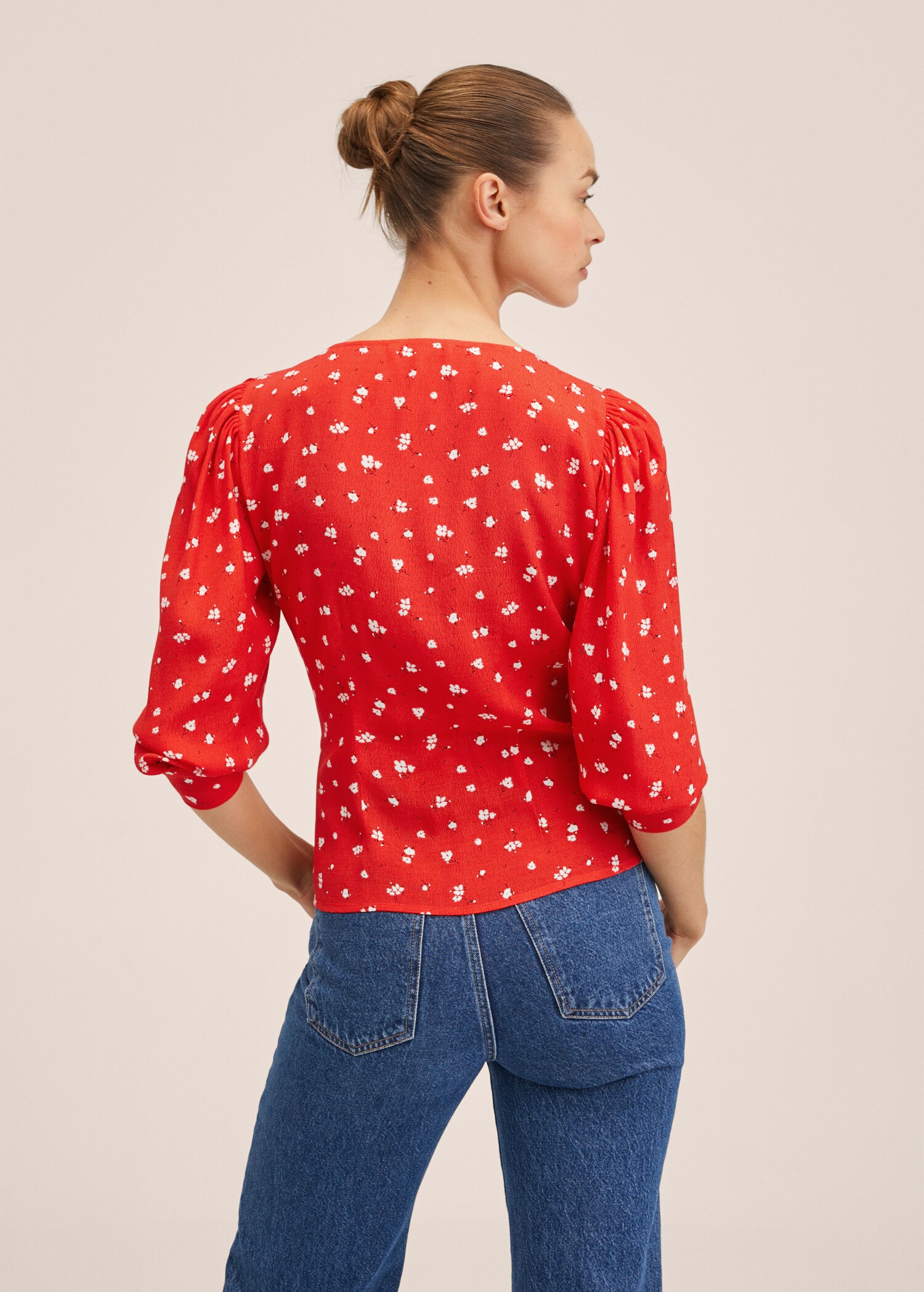 Buttoned wrap blouse - Reverse of the article