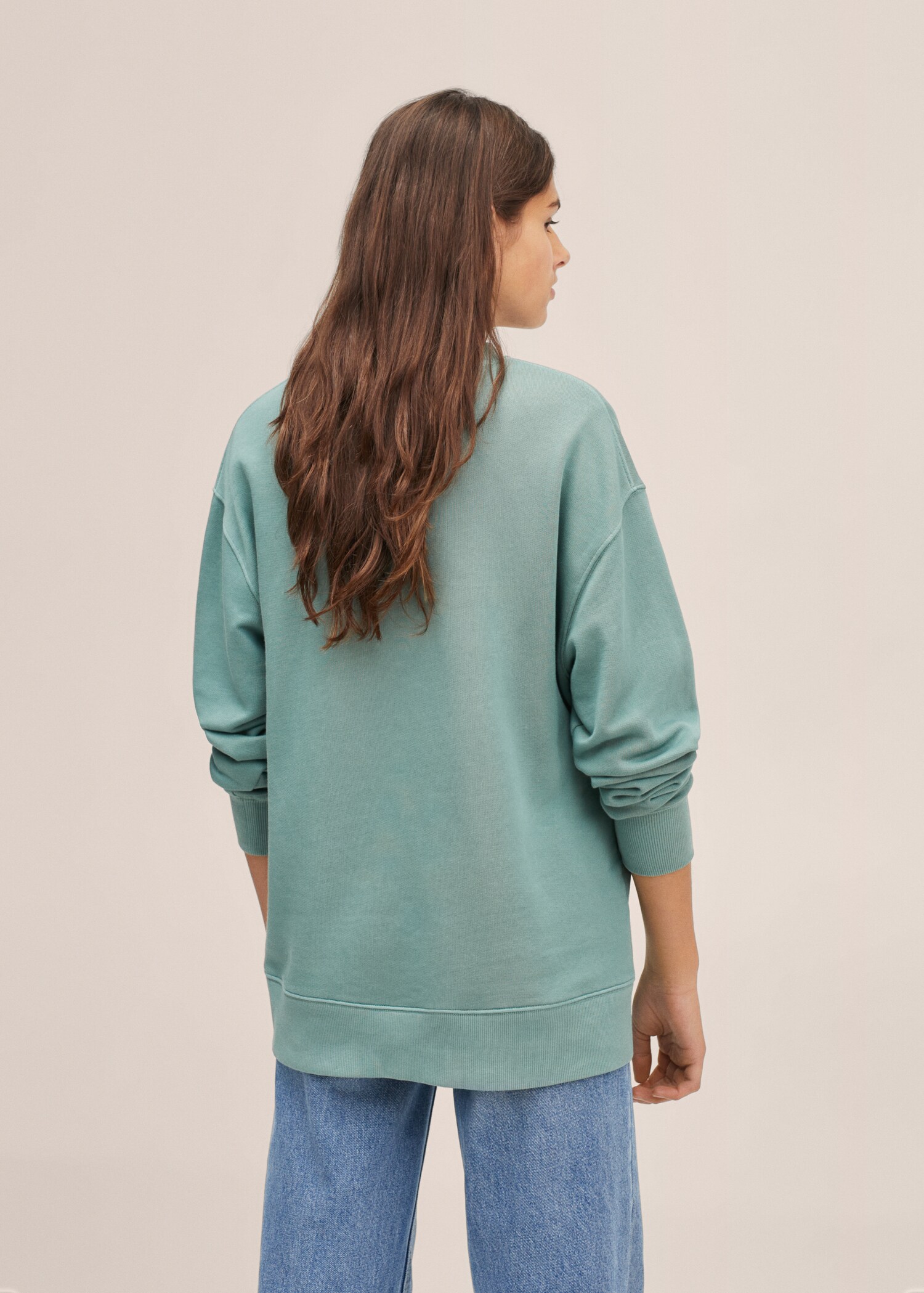 Dessuadora unisex col·lecció T - Revers de l'article