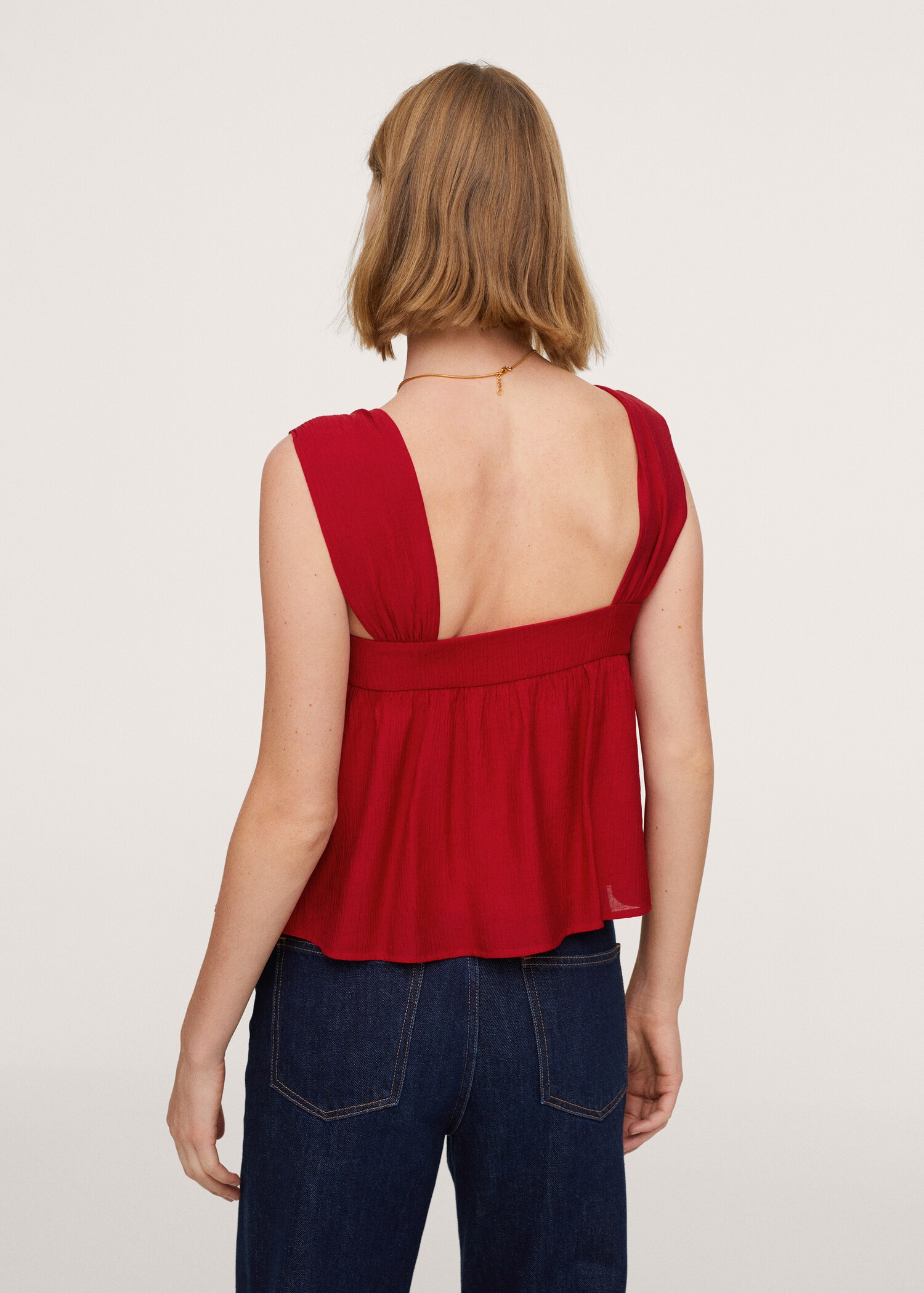 Ruffled strap top - Reverse of the article
