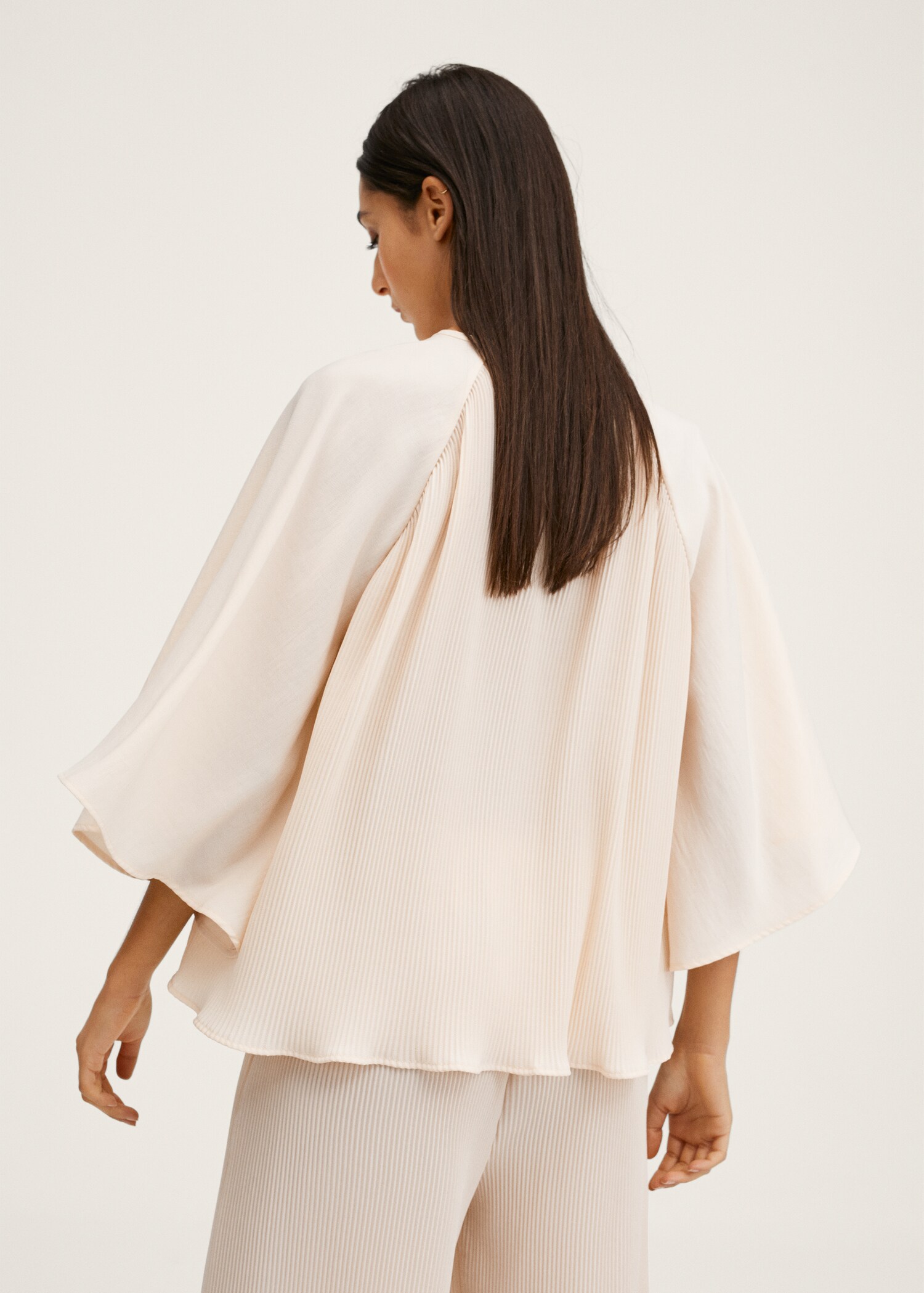 Blusa mangas acampanadas - Reverso del artículo