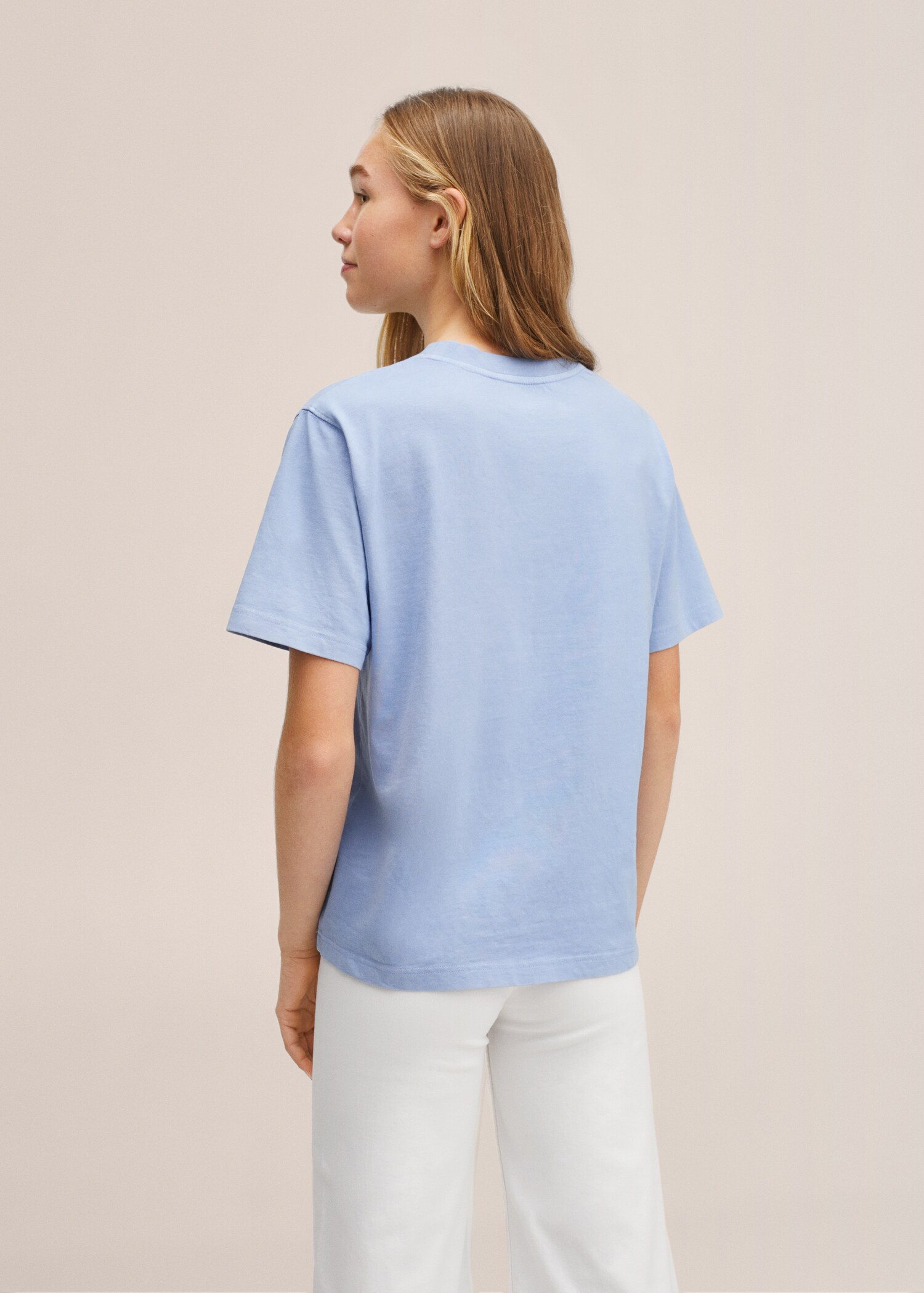 T Collection unisex t-shirt - Reverse of the article
