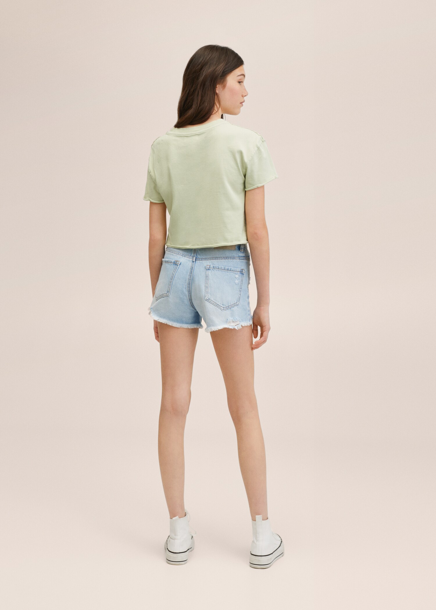 Decorative ripped denim shorts - Reverse of the article